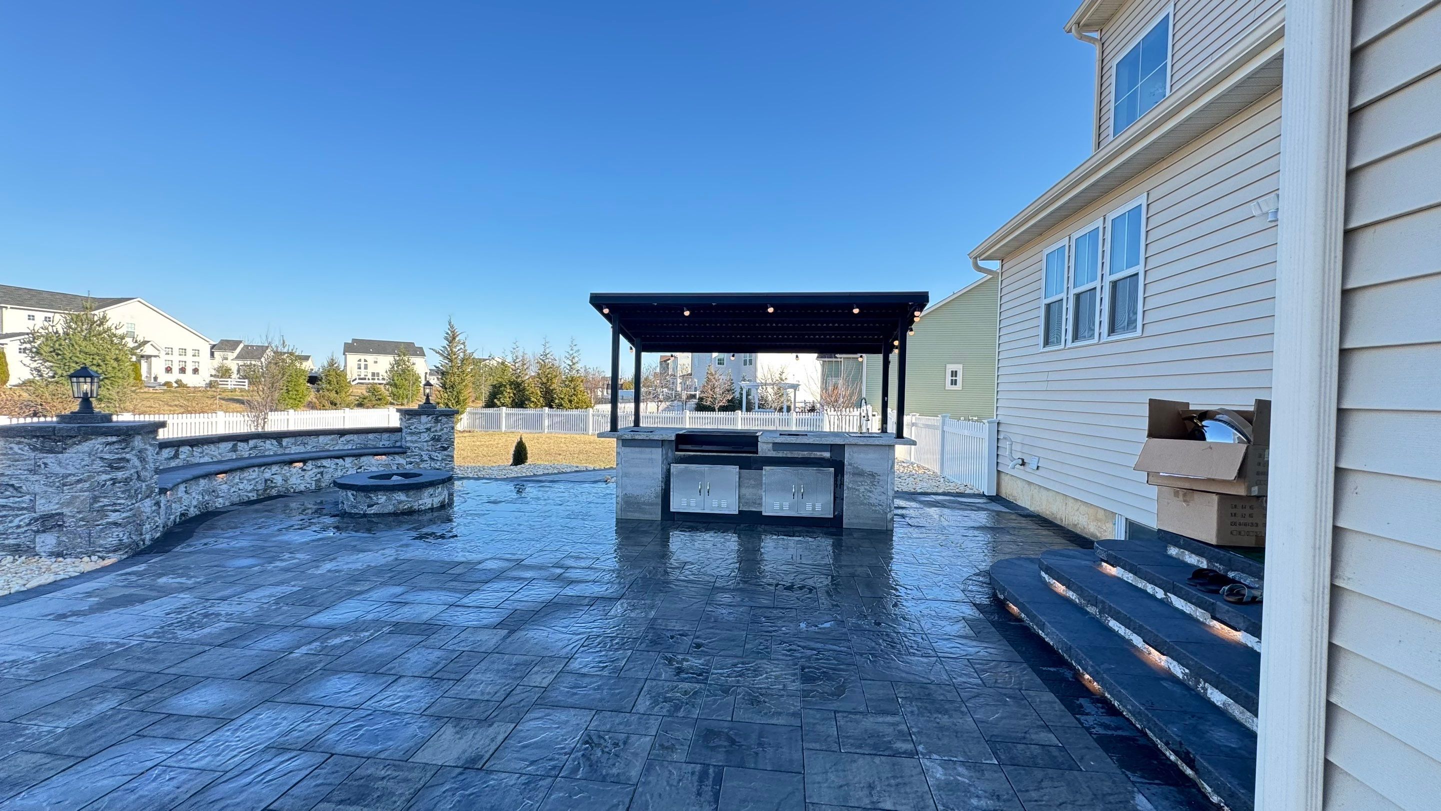 Custom Belgard patio by Studio G Indoor Spaces & Outdoor Living