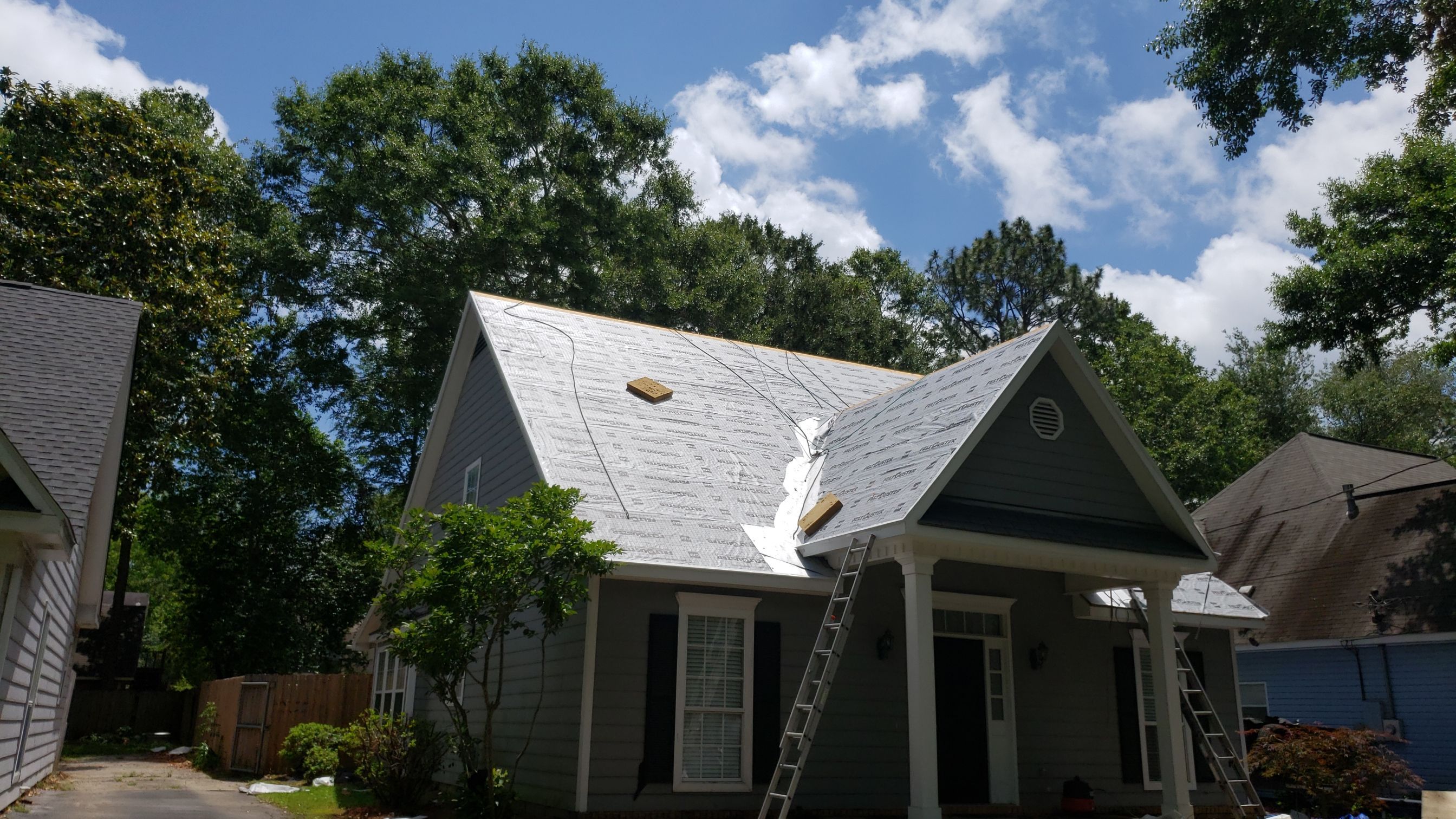 Residential Roofing Installation using Roof Replacement by American Roofing & Construction LLC