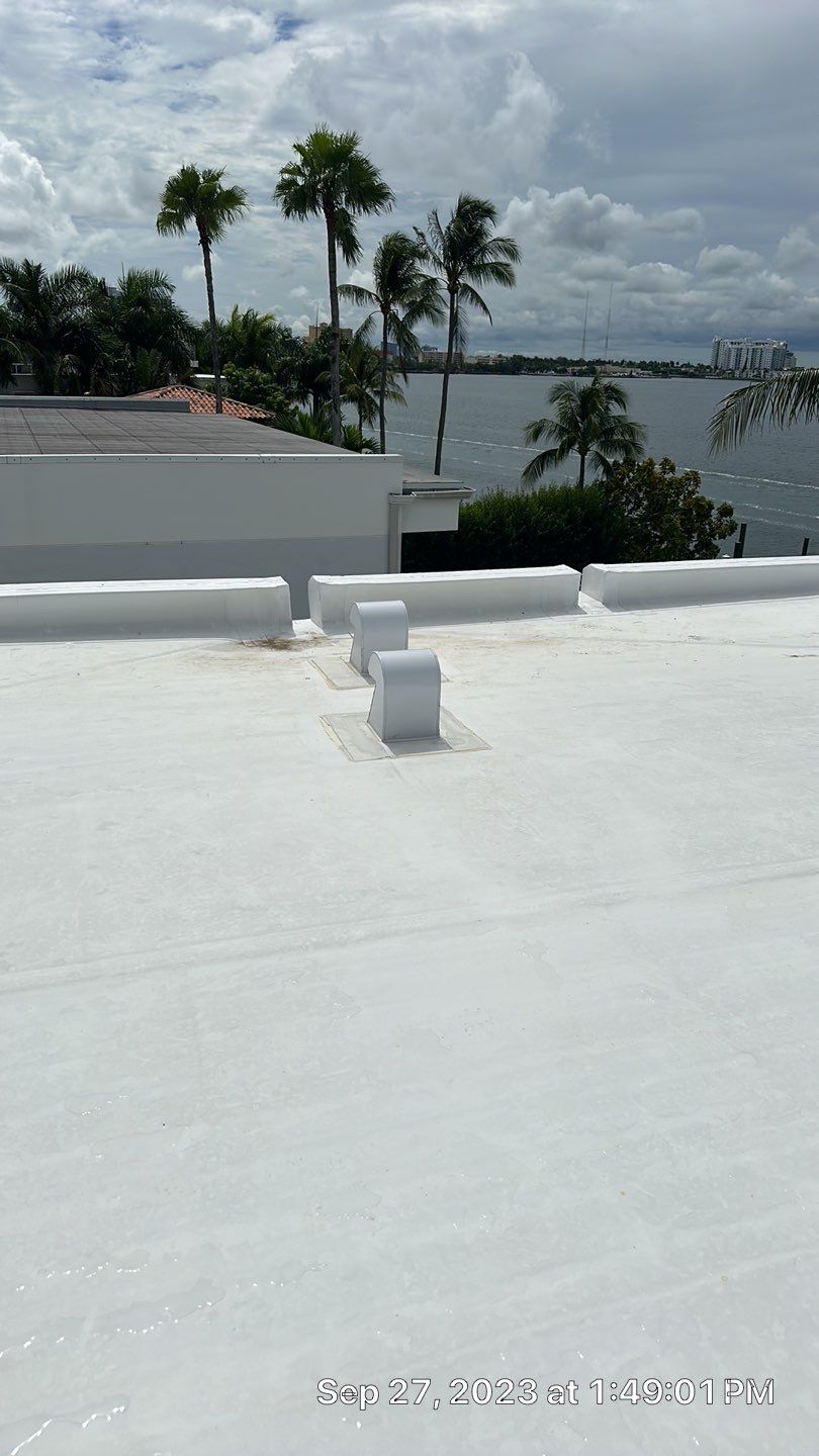Flat Roof White Membrane and Insulation Installation in Miami Beach by AJF ROOFING INC