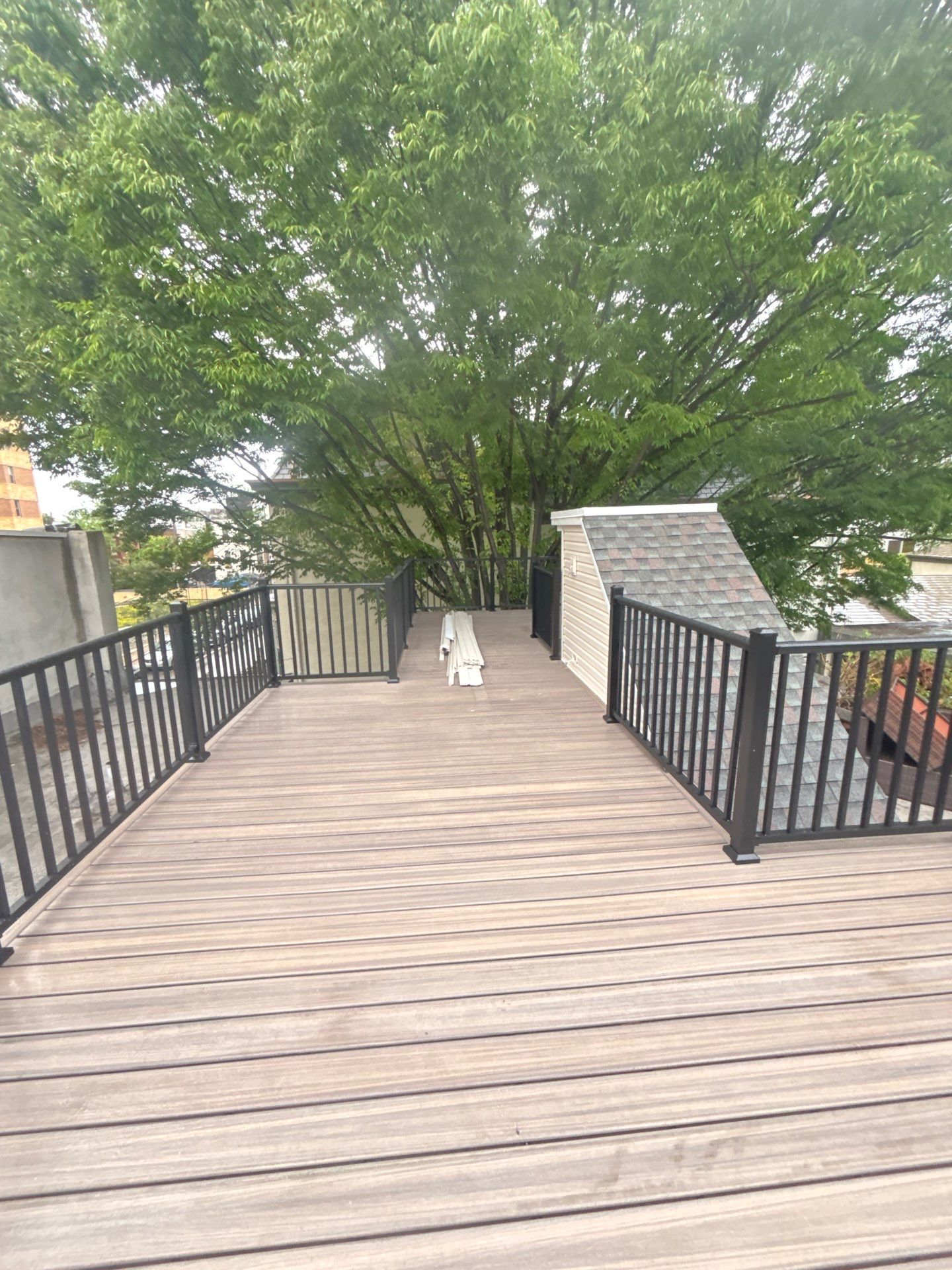 Roof Replacement and Custom Trex Roof Top Deck Project in Philadelphia, Pennsylvania by Philadelphia Quality Roofing