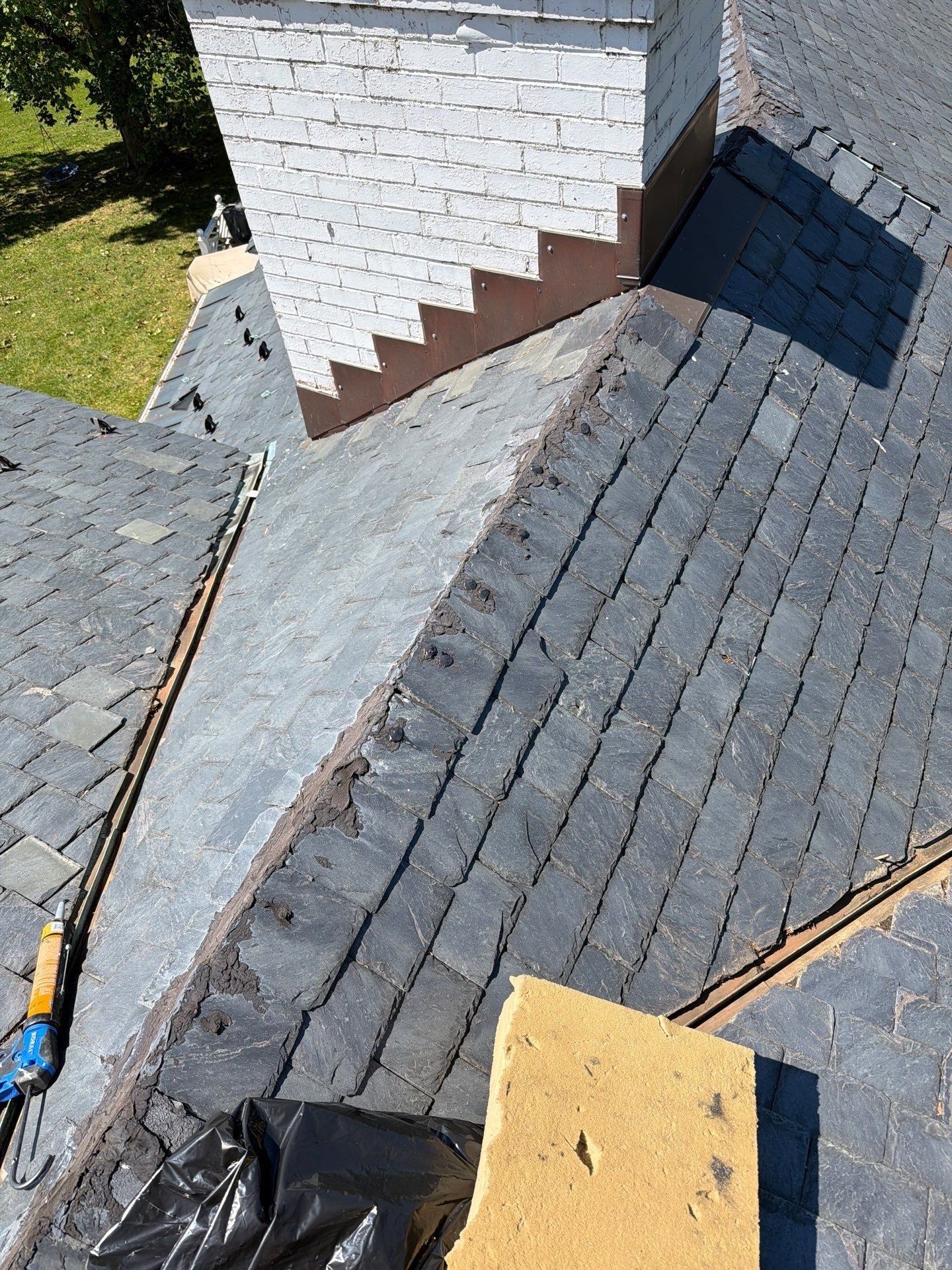 Historical Slate Roof Repair and Chimney Flashing Restoration in West Point by Cade Construction