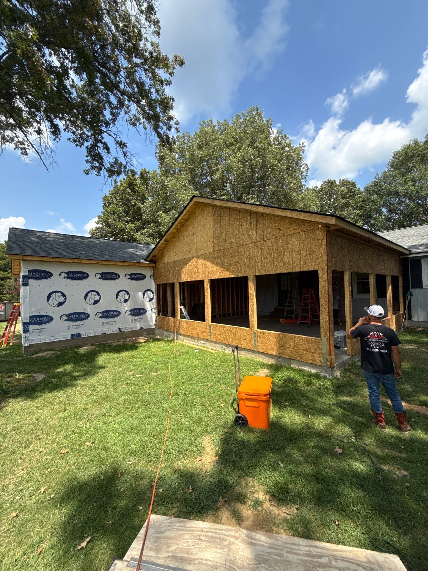 Sunroom and Garage Addition by Skilled Construction LLC