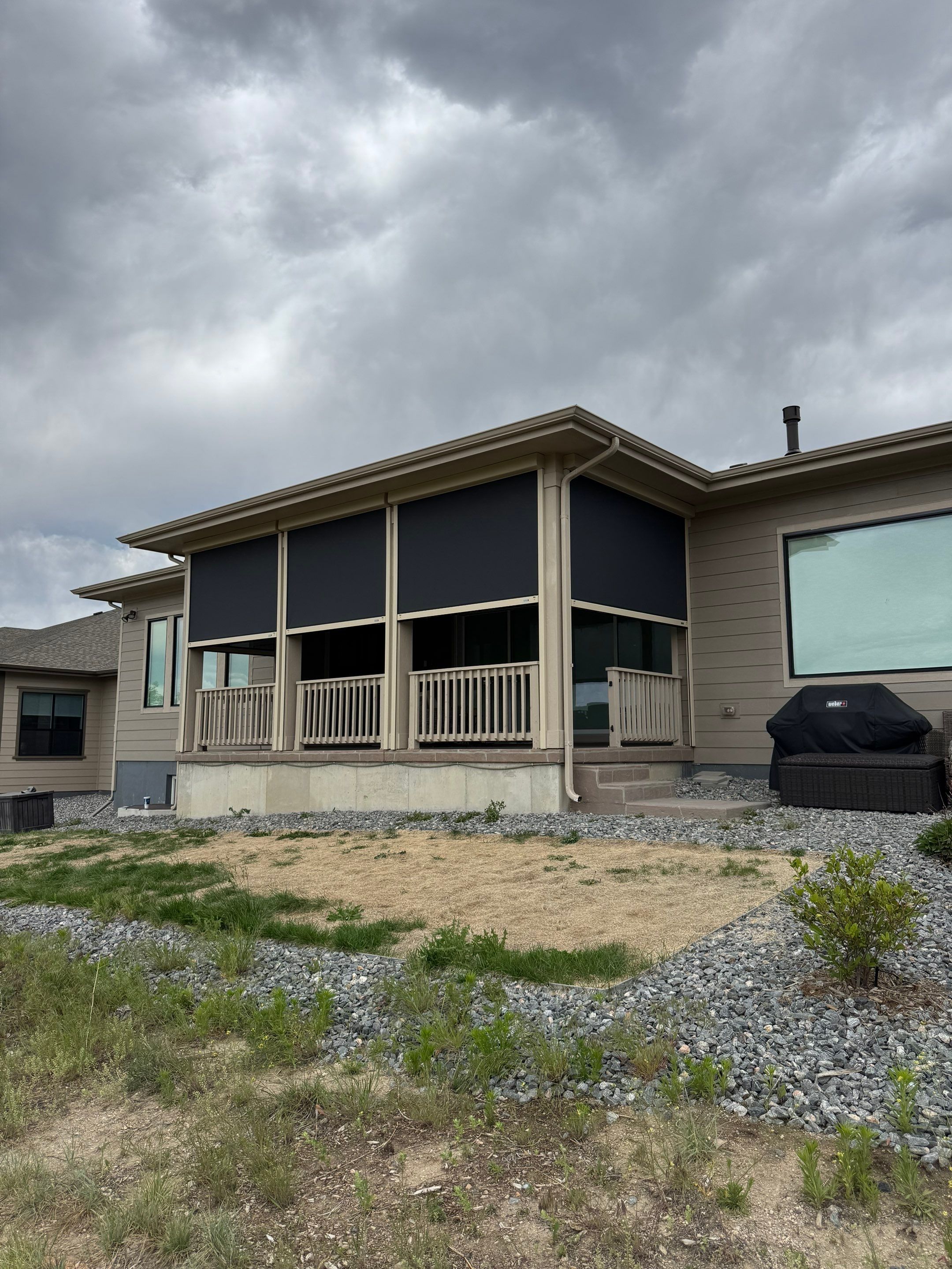 Exterior MagnaTrack Solar Screen Installation on Castle Rock Covered Patio by Outdoor Solutions Colorado