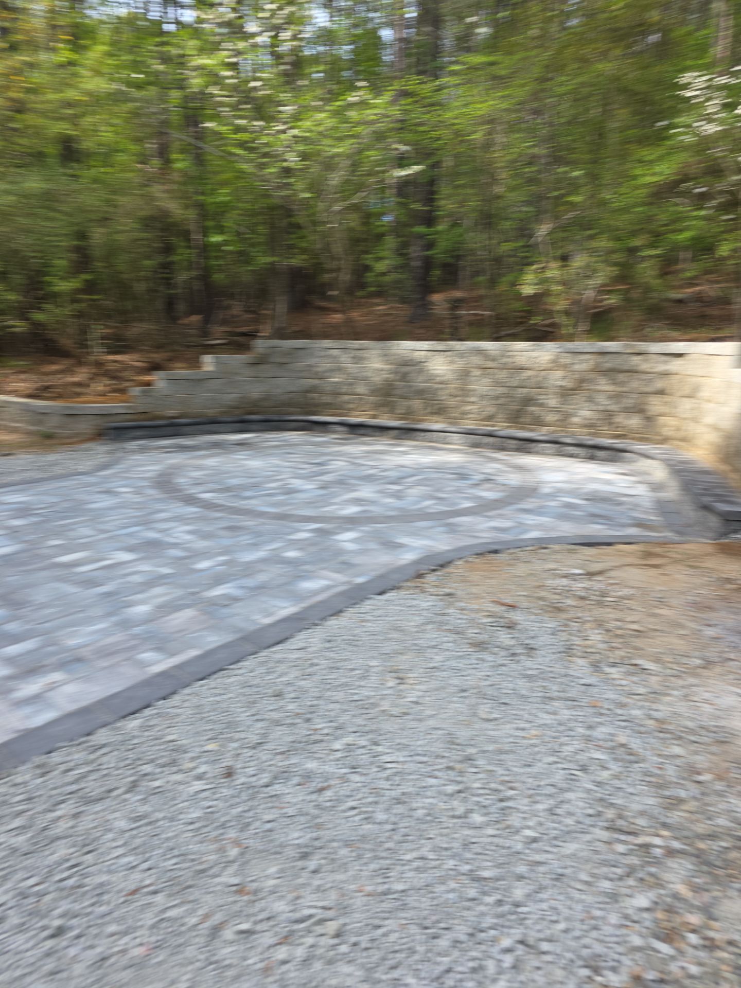 Pittsboro Outdoor Living Transformation – Retaining Wall, Paver Patio & Elevated Deck by Elite Remodeling and Design LLC