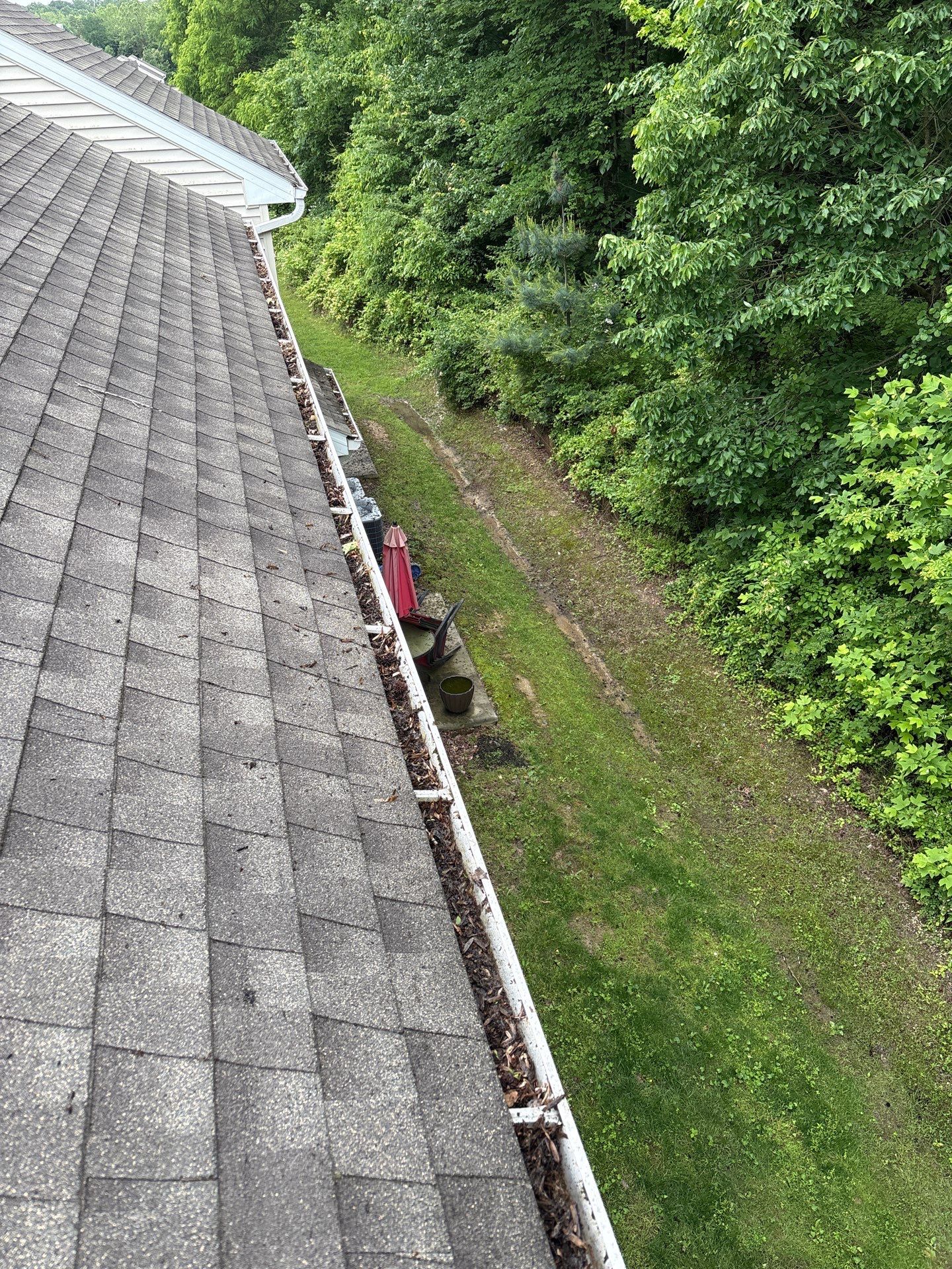 Commercial gutter cleaning York, PA before photo with filled gutters