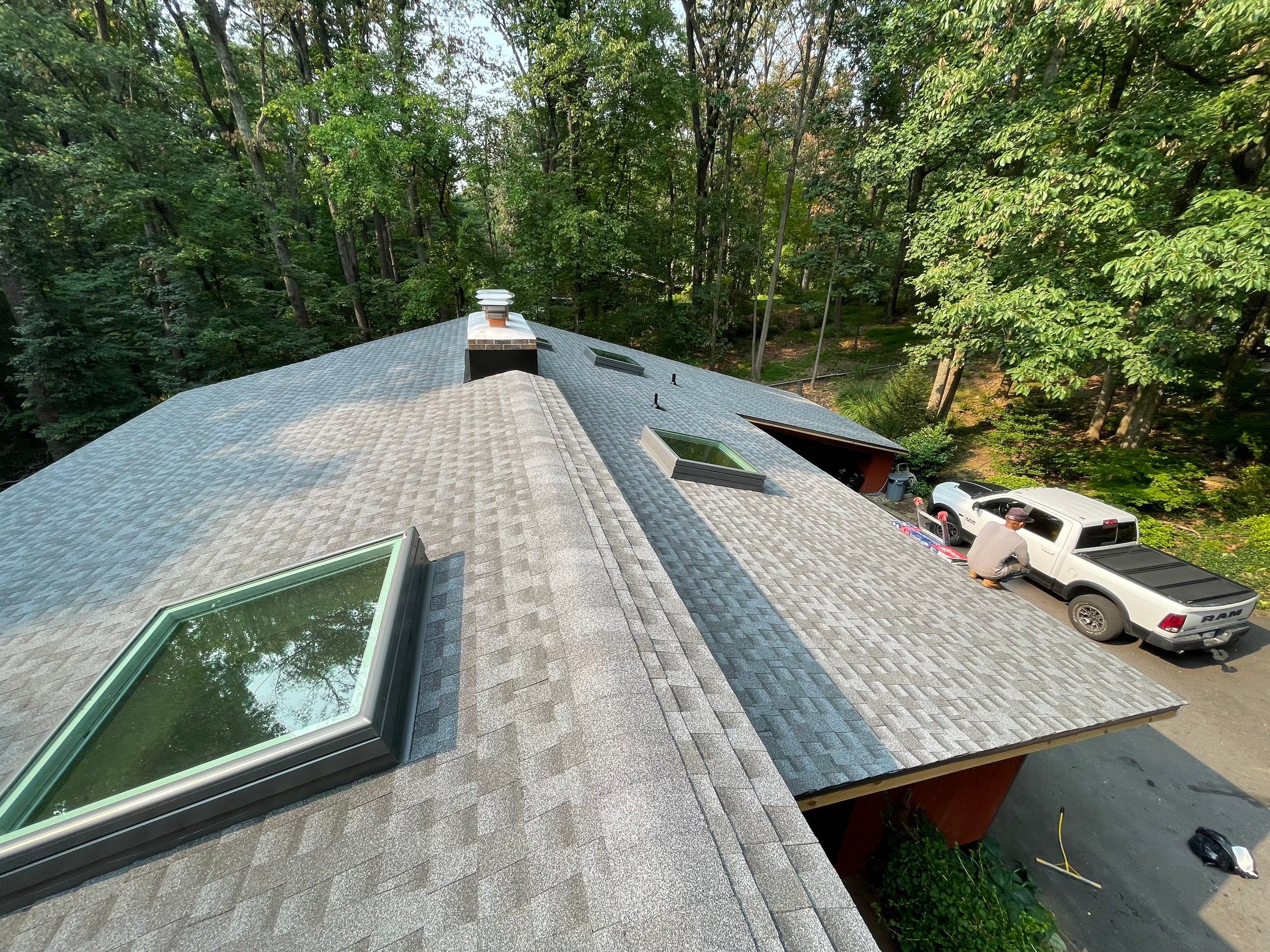 Deckhouse Roof Replacement by American Home Contractors