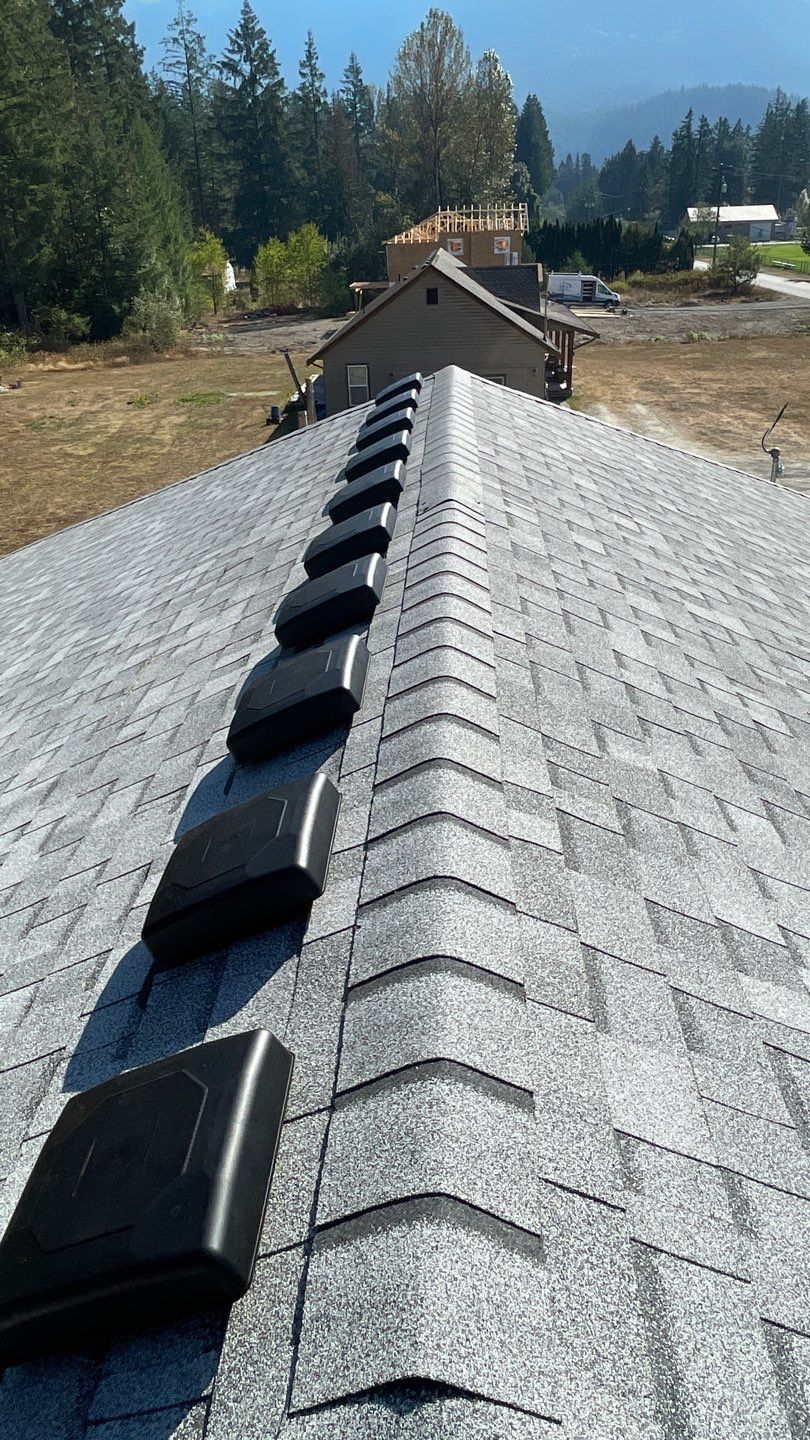 Residential Roofing Installation using OC Oakridge shingles by Top Notch Roofing Inc