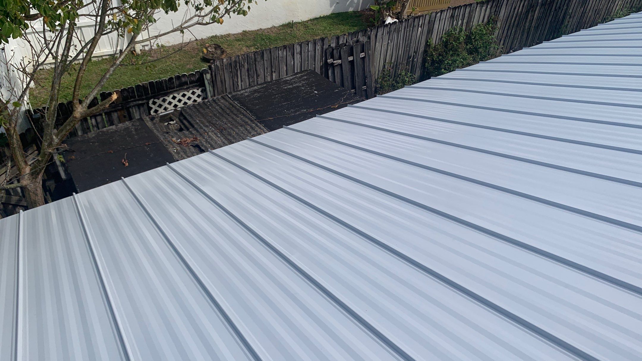 Residential Roofing Installation using 1" Nail strip metal roof by BLUES BROTHERS ROOFING