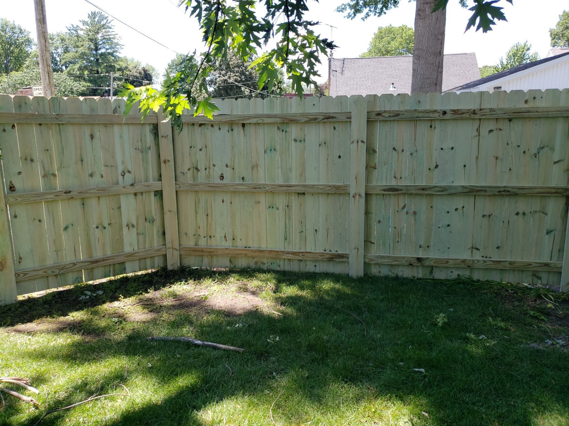 Pressure-Treated Pine Privacy Fence Replacement in Waterloo, Iowa by Perfect Picket Fence and Stain