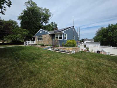 Siding and Window Replacement Featuring Kitchen Garden Window in Linthicum Heights