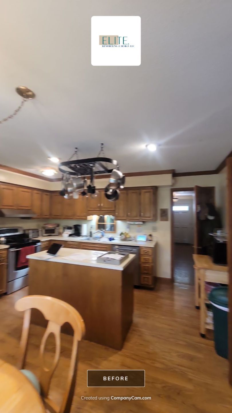 A Pathway to Personality – A Two-Tone Kitchen Transformation in Apex by Elite Remodeling and Design LLC