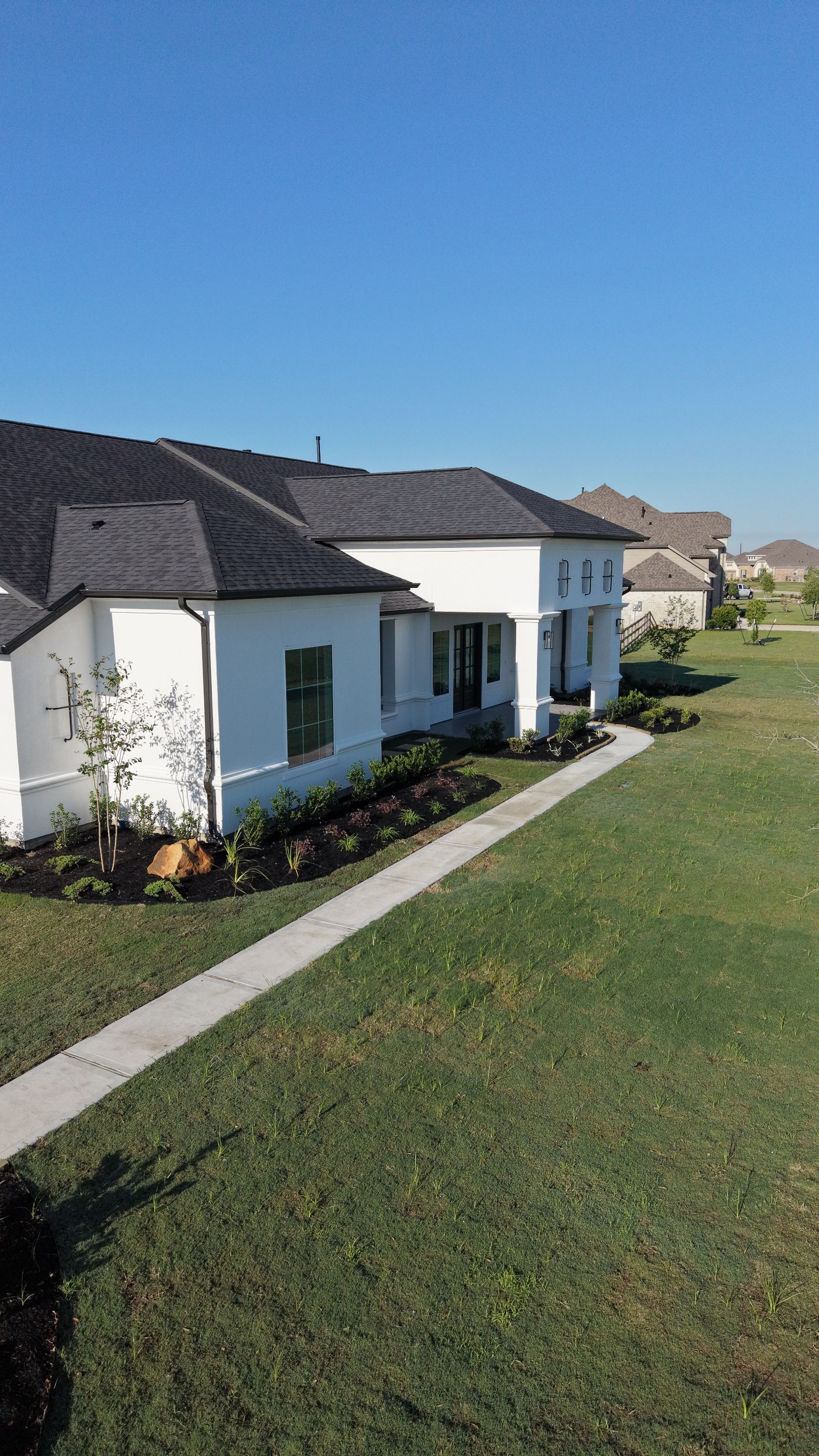 Custom Stucco Masterpiece with Precision Foam Detailing – Waller, TX by Apex Conventional Stucco Llc