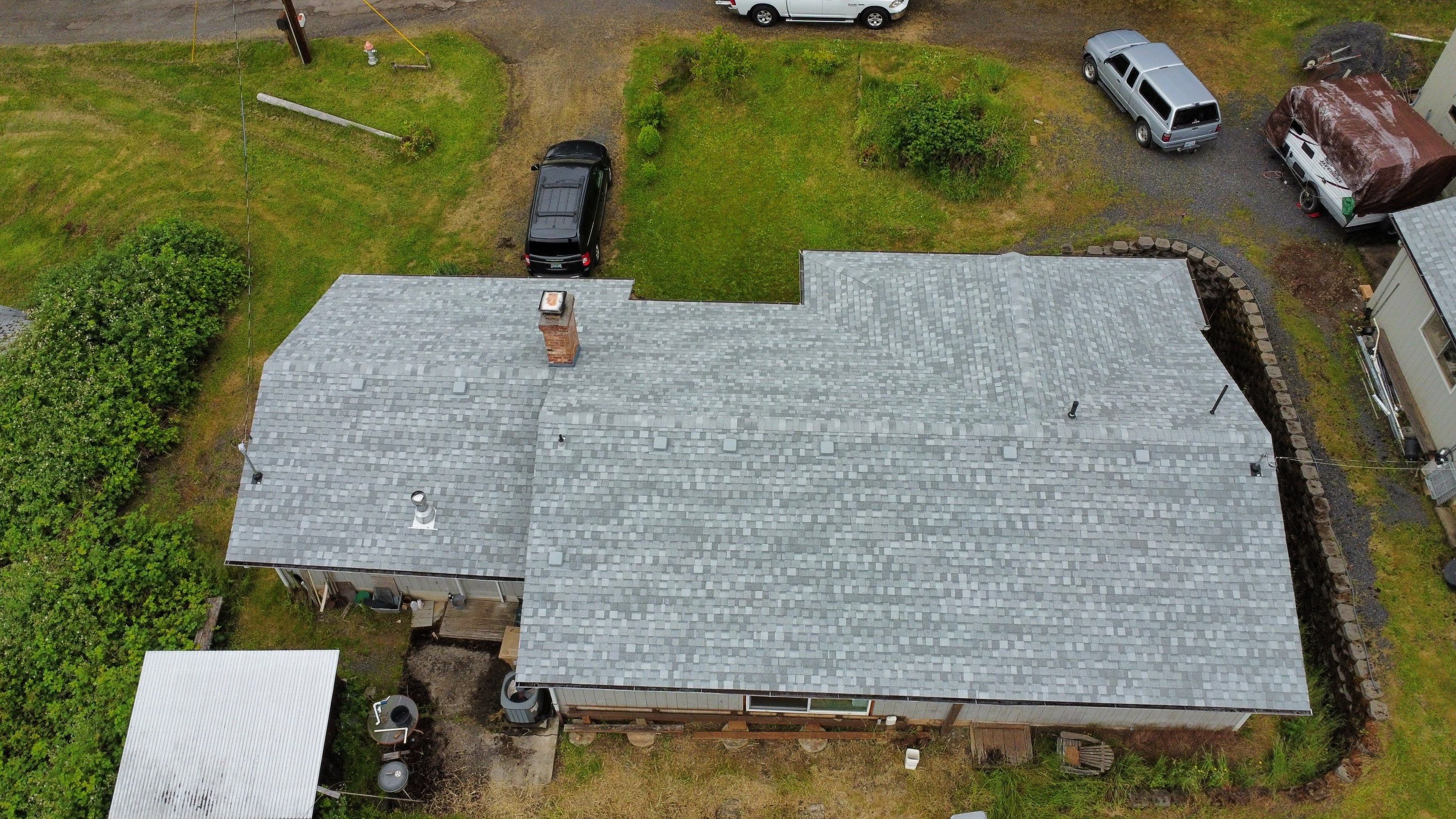 Residential Roofing Installation using IKO Dynasty (Color: Frostone Grey) by Orezona Building & Roofing Company, Inc.