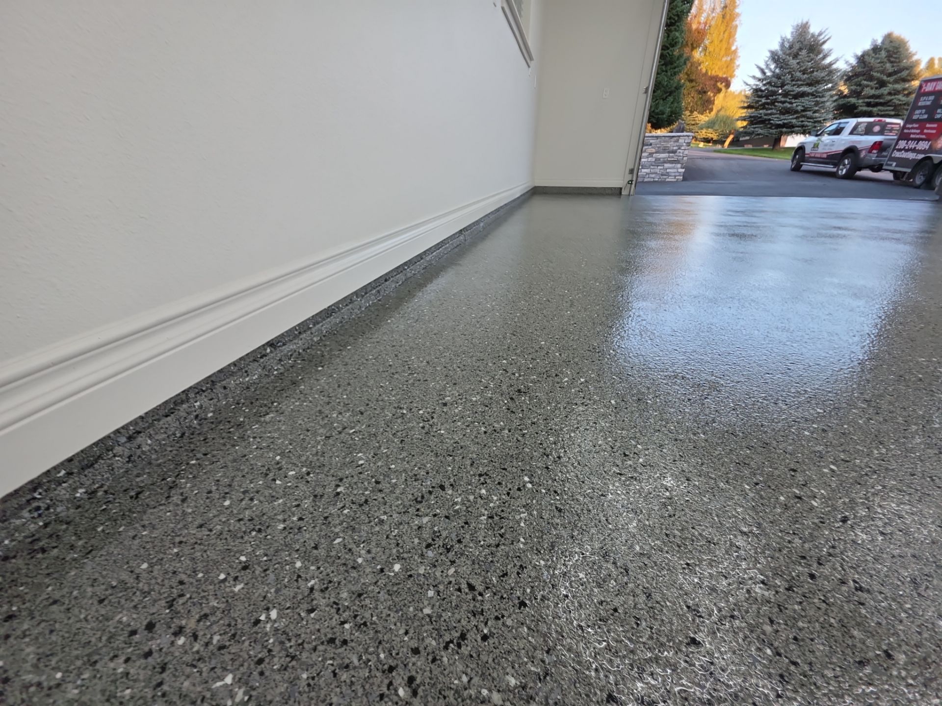 Custom Garage Transformation with Polyaspartic Coating and Hexagonal LED Lighting by Croc Coatings, LLC
