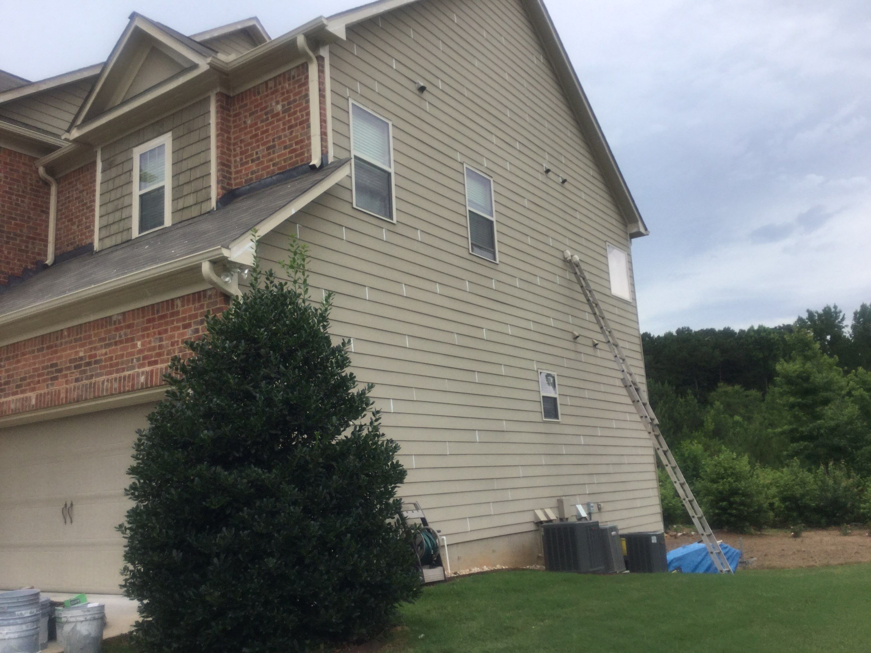 Full Exterior Siding and Trim Painting in Powder Springs by Swift Home Renovations
