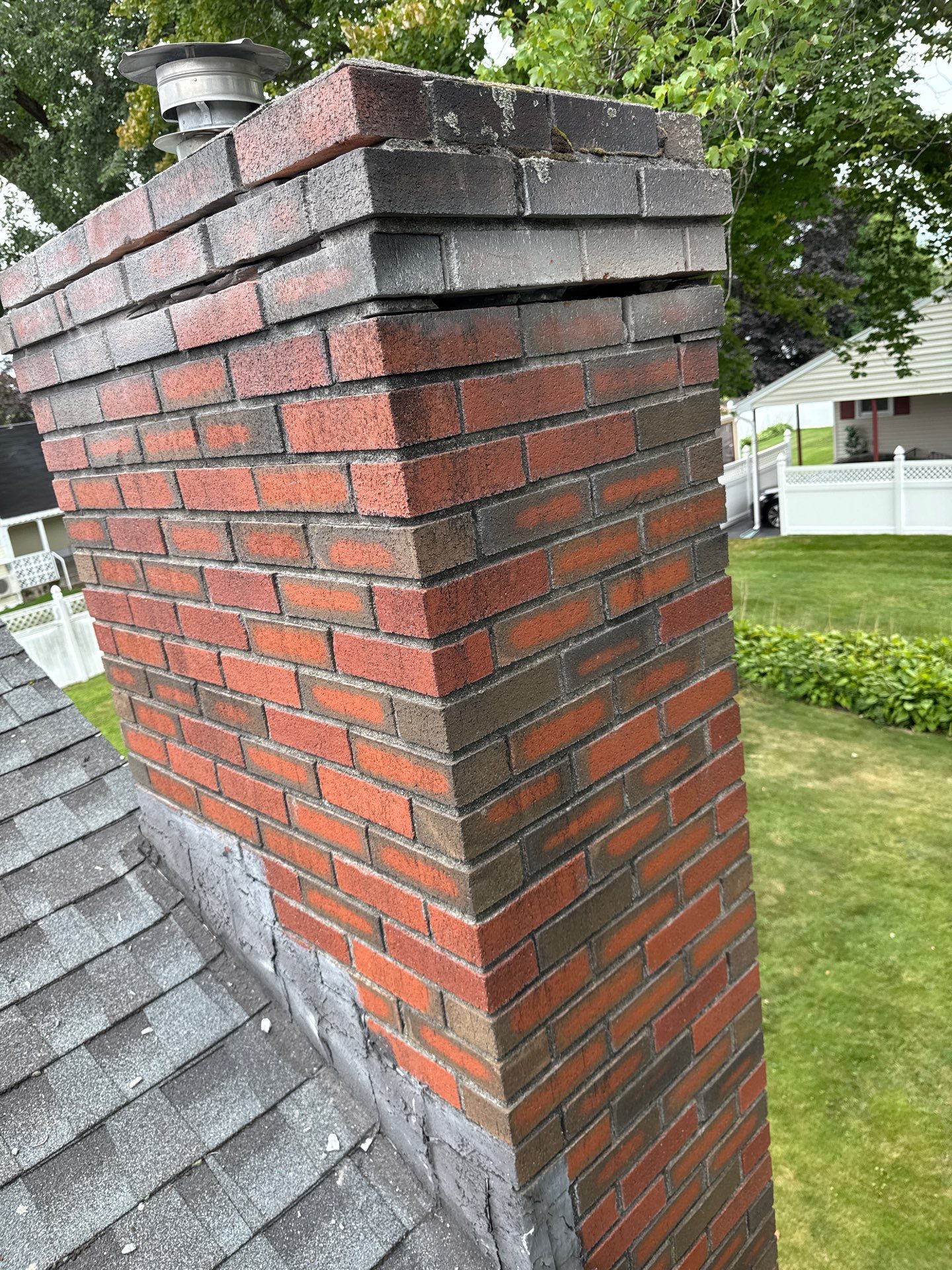 Lowell Premium Velux Curb-Mount Skylight & Chimney Restoration by Mighty Dog Roofing of Greater Middlesex County