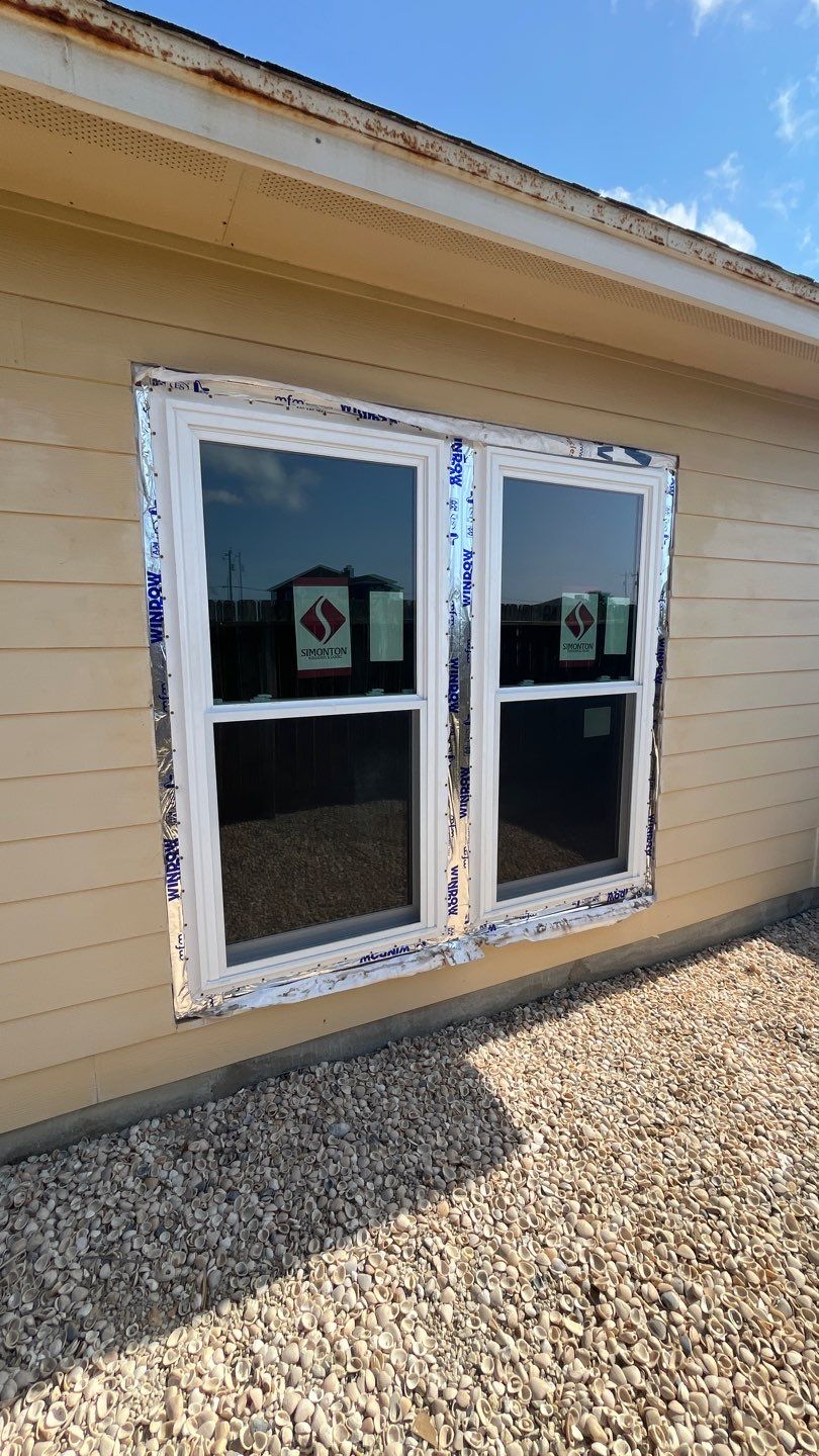 Curved Trim Windows by Bayfront Roofing and Construction