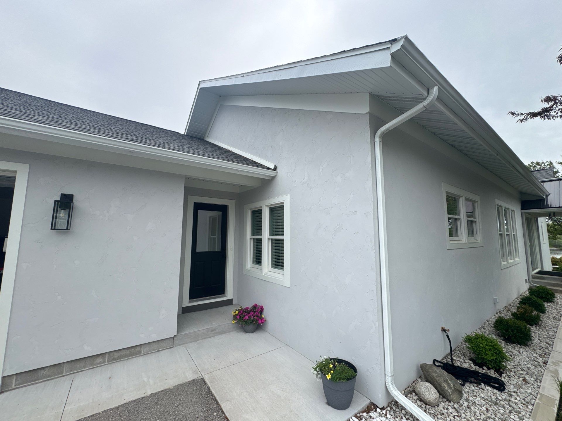 Norton Shores Residential Stucco Repair and Exterior Painting Refresh by Gordon Painting