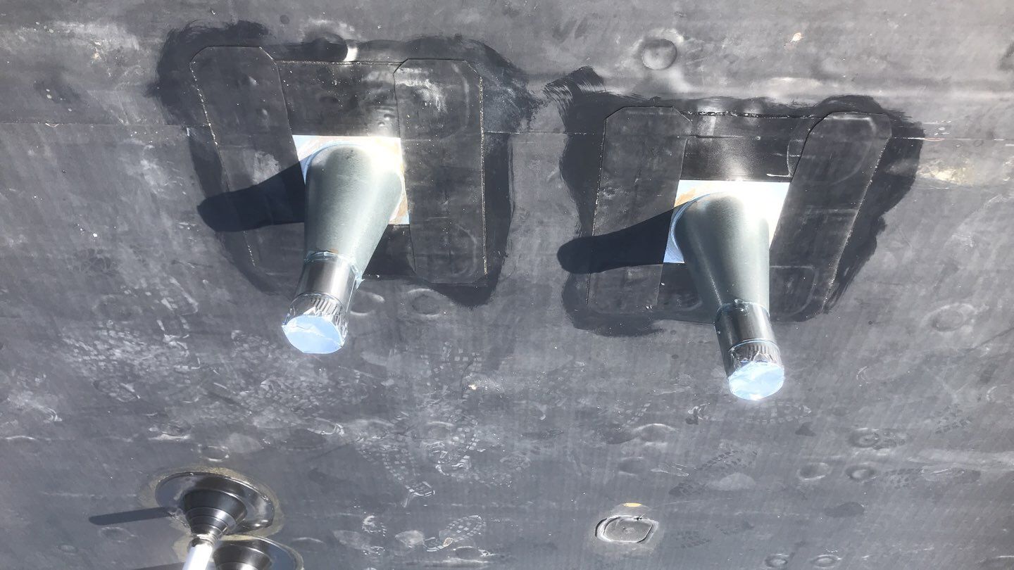 Commercial Roofing Installation using EPDM with white gutters by A Plus Exterior