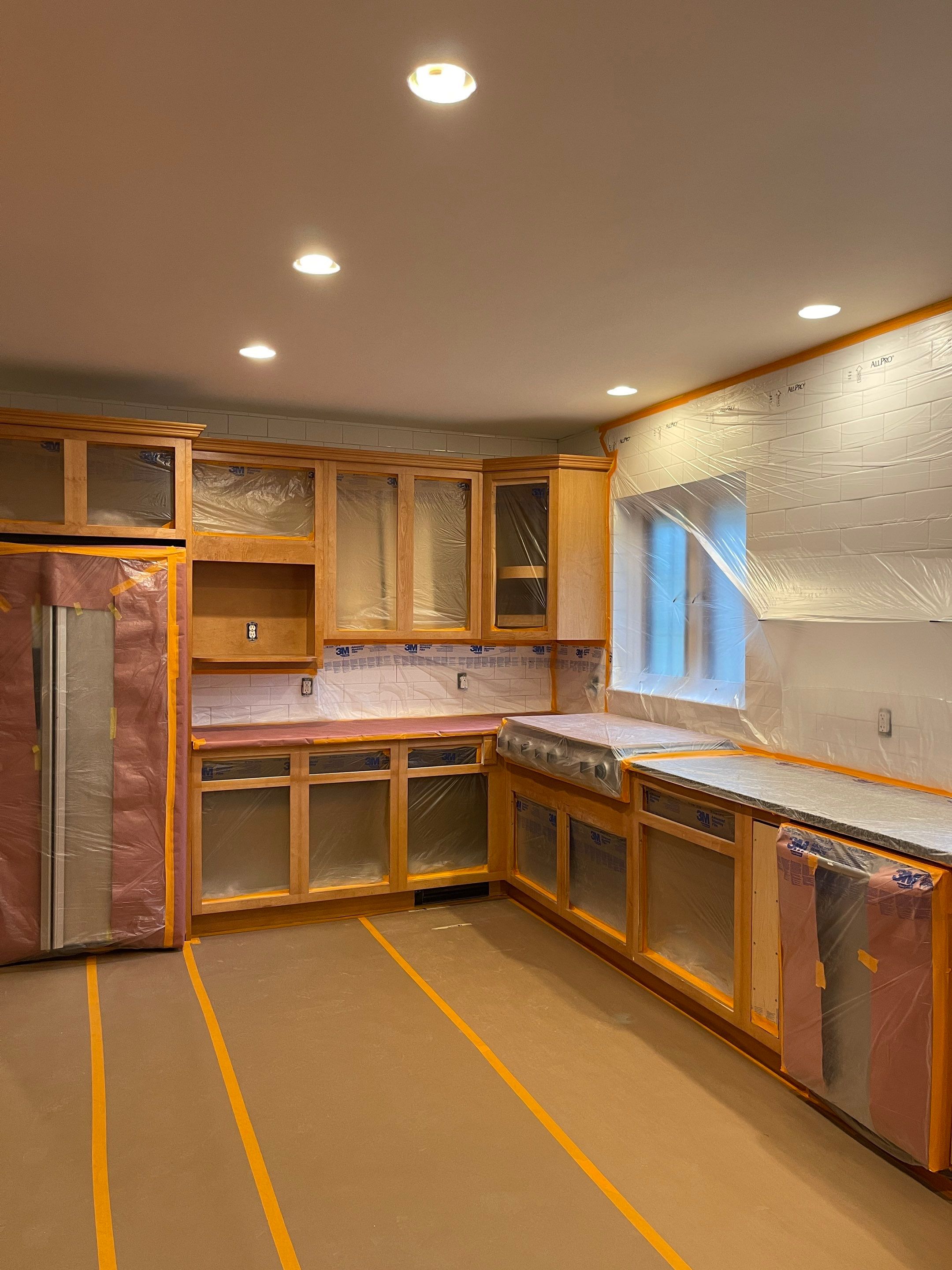 Kitchen Cabinet Painting using Milesi 2k by Trendy Walls Inc.