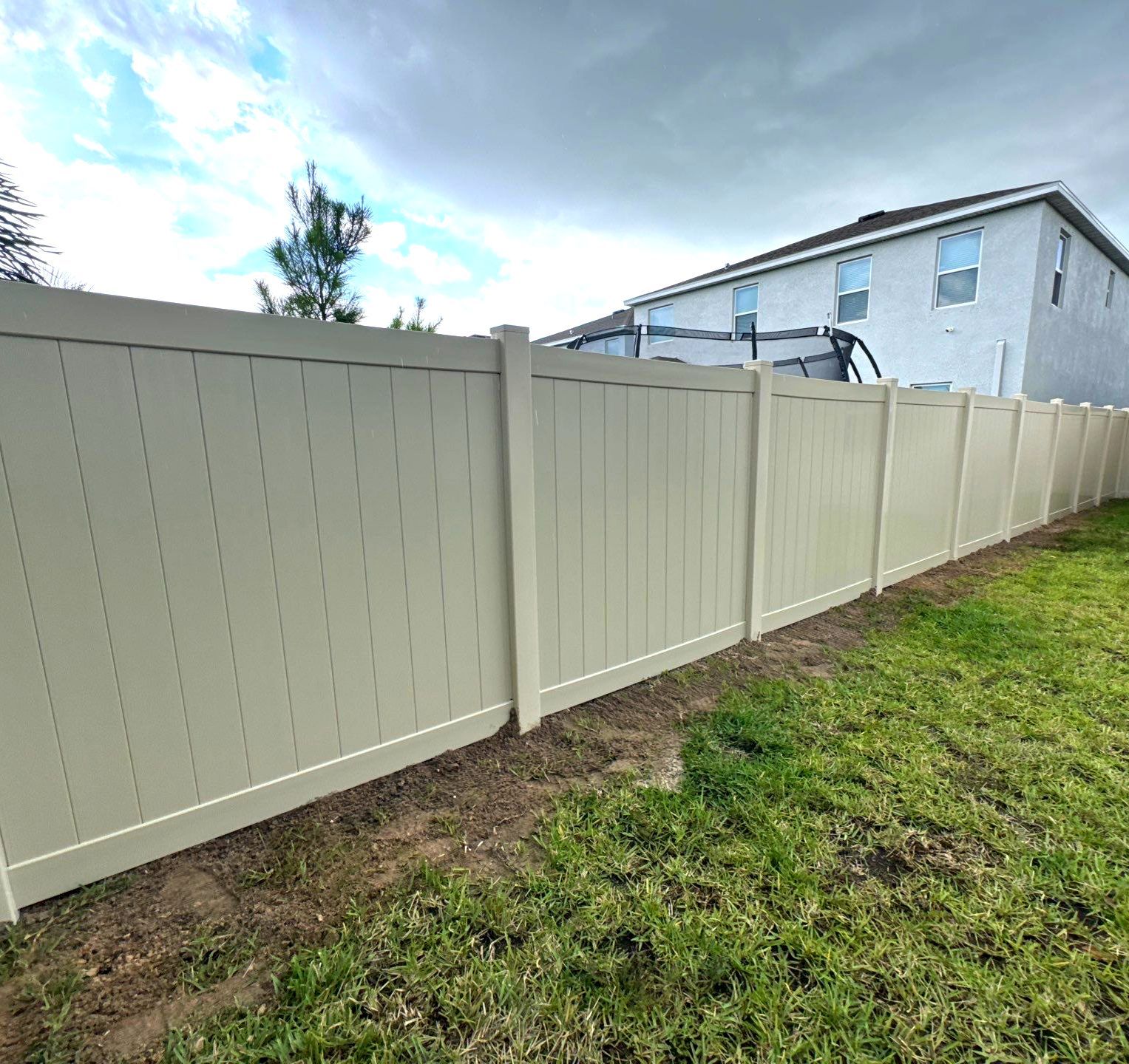 Vinyl Fence Installation using Tan Vinyl Privacy Fence by Asap fence and gates, LLC