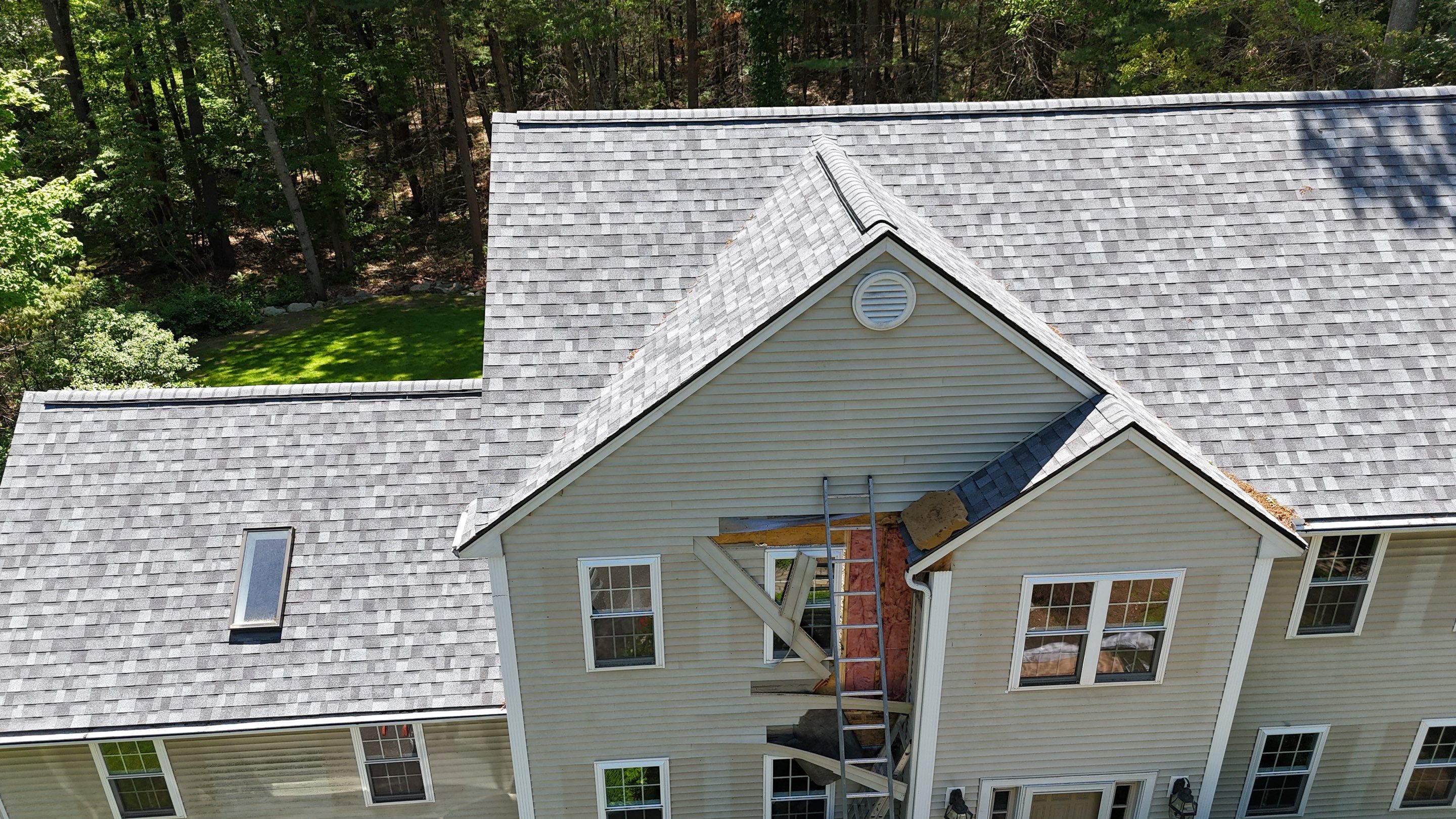 Leak Repair & Gutter Replacement in Chelmsford, MA by Mighty Dog Roofing of Greater Middlesex County