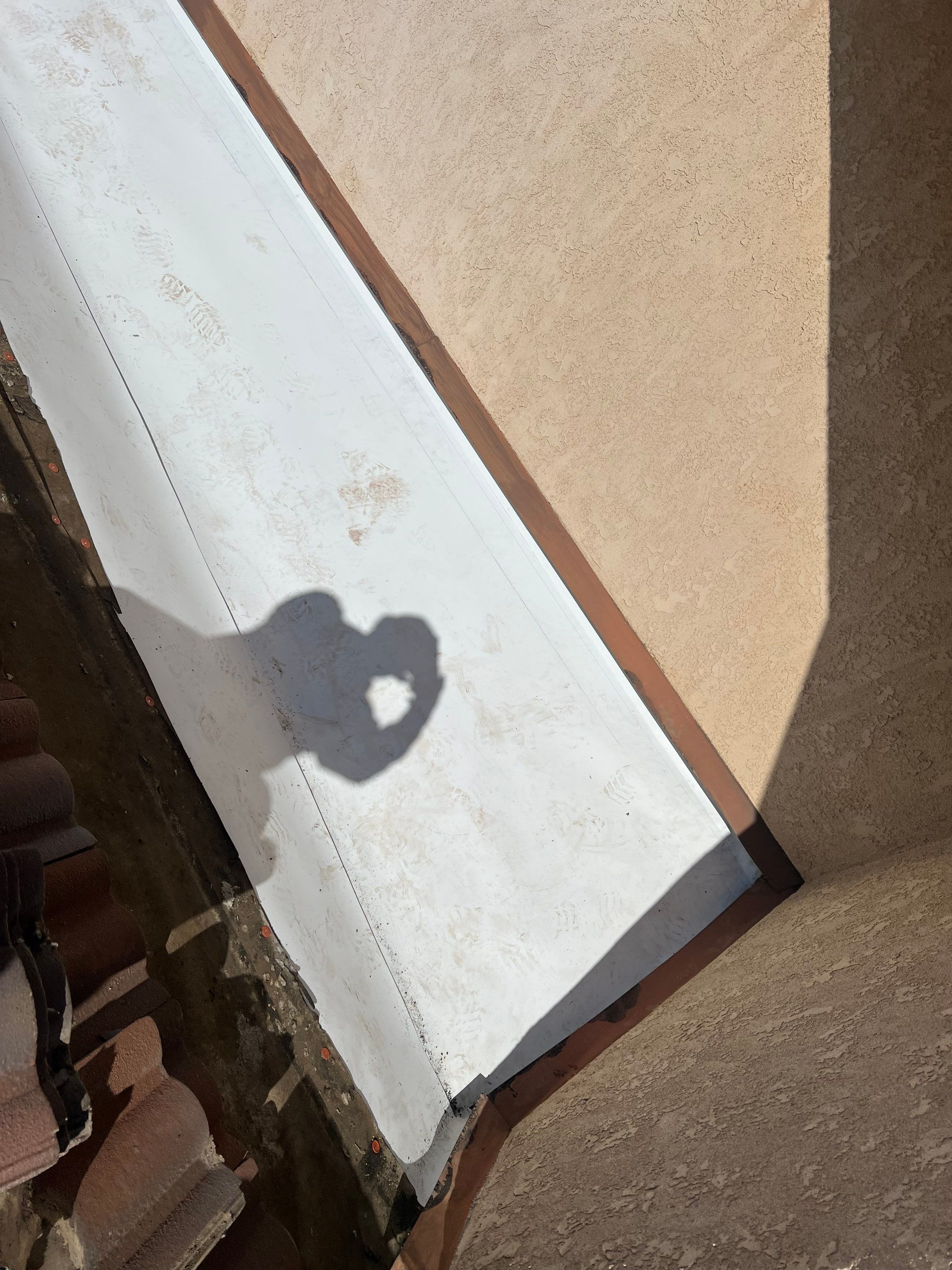 Tile Roof repair by Grandmark Service Company