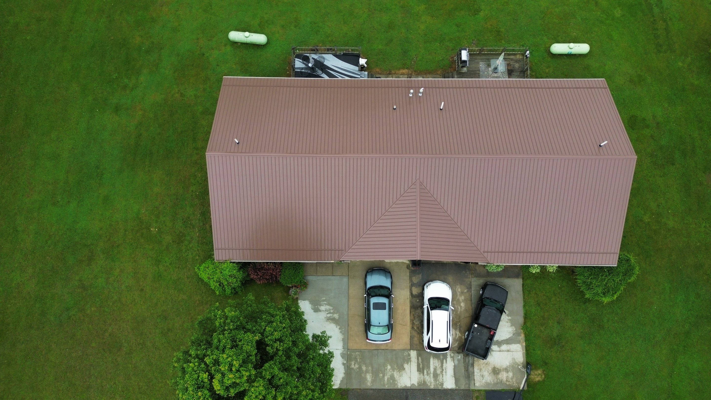 Residential Roofing Installation using Performance Panel Metal - Coca Brown by RoofX 