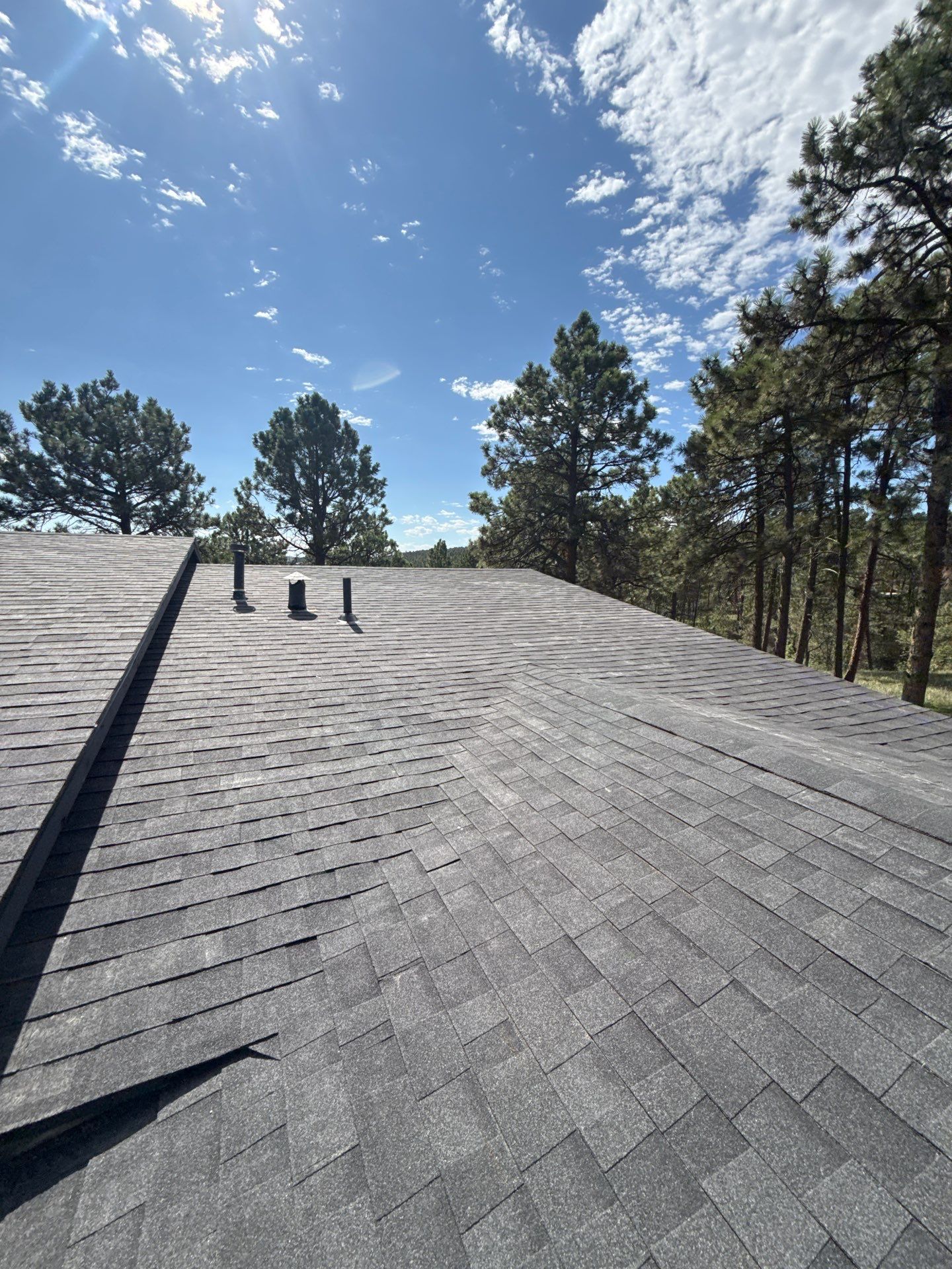 Full Architectural Shingle Installation for Contemporary Rapid City Residence by Weather-Tite Exteriors LLC