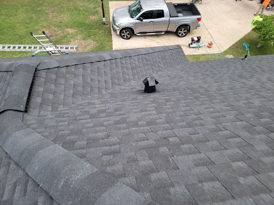 Residential Roofing Installation using Roof Replacement by American Roofing & Construction LLC