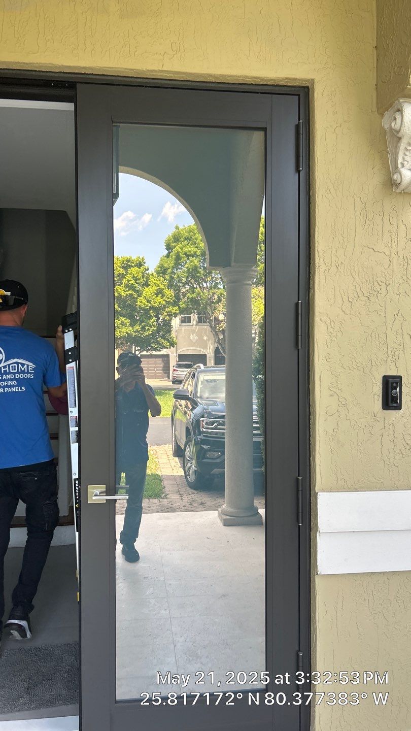 New Windows and Doors with a Striking Front Entry Door by ASP SuperHome
