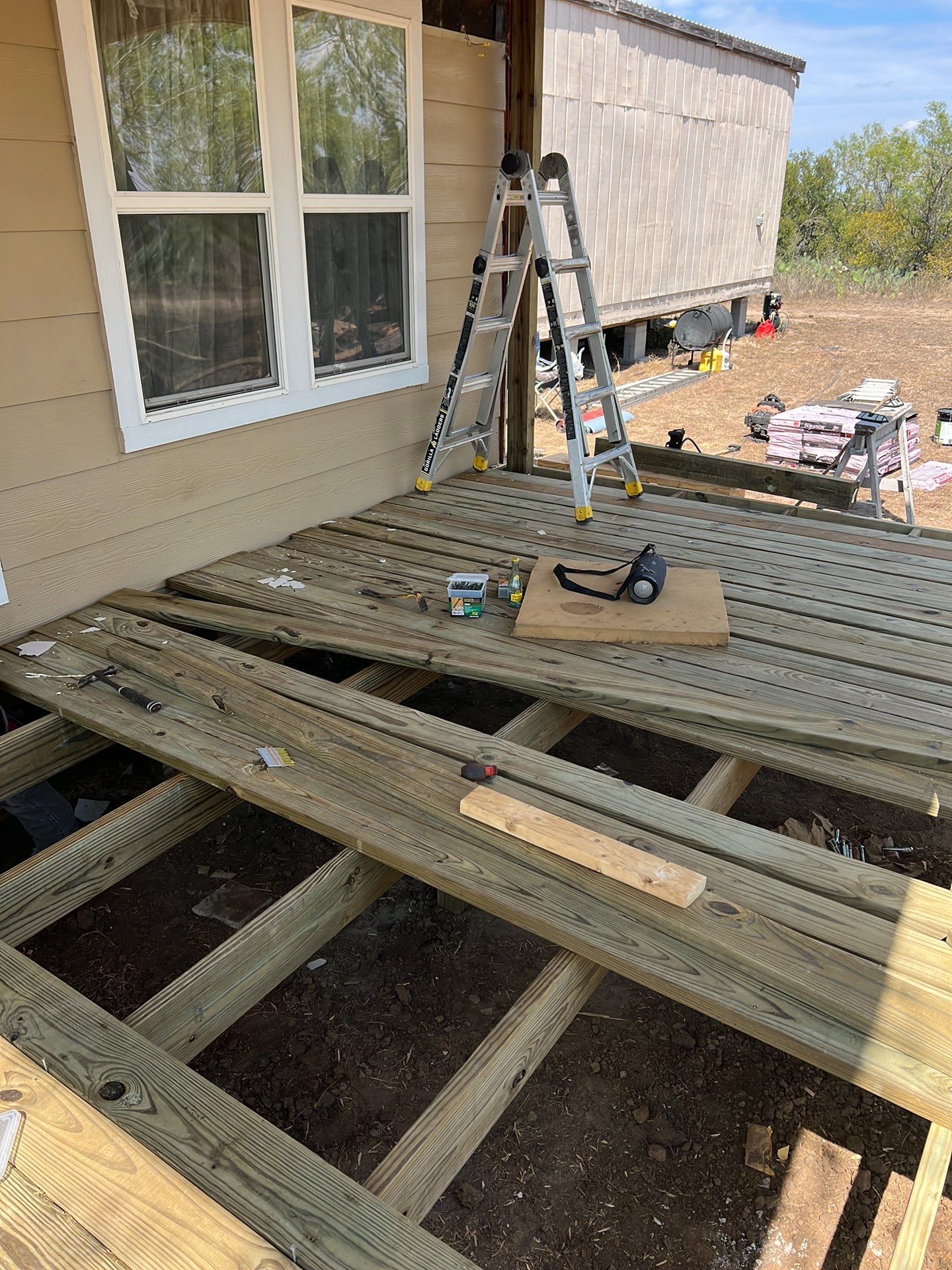 Front Porch Sitt'n by Bayfront Roofing and Construction