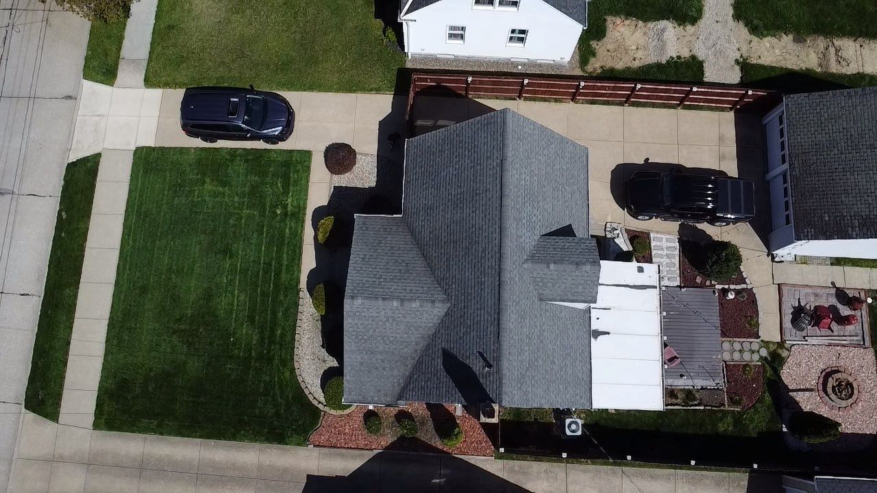 Cleveland Roof replacement - Charcoal shingles by Atlas Roofing & Restoration