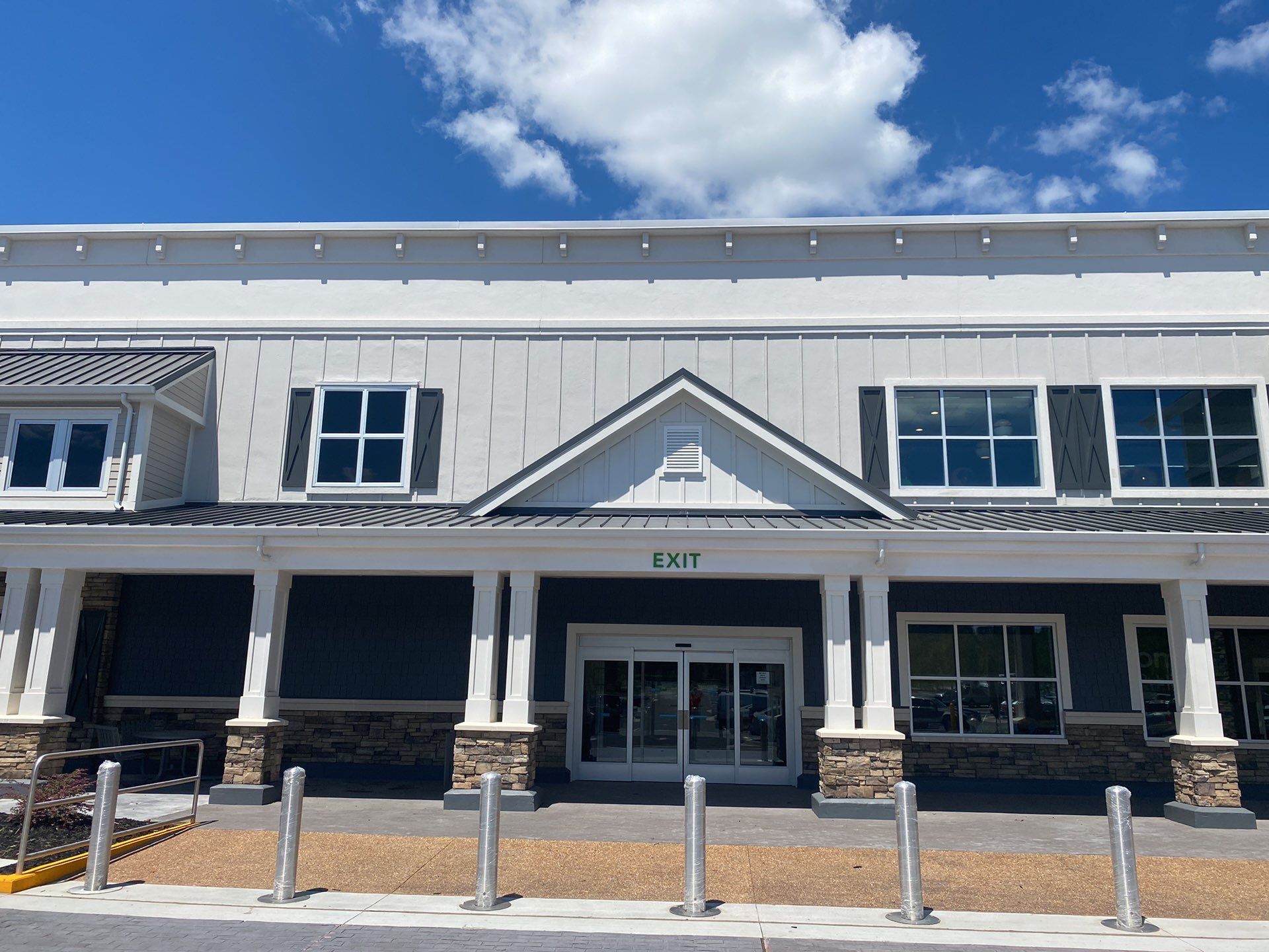 Commercial Roofing Installation using Berridge 11 1/2" Cee Lock .032 Aluminum Charcoal Grey by Infinity Metal Systems