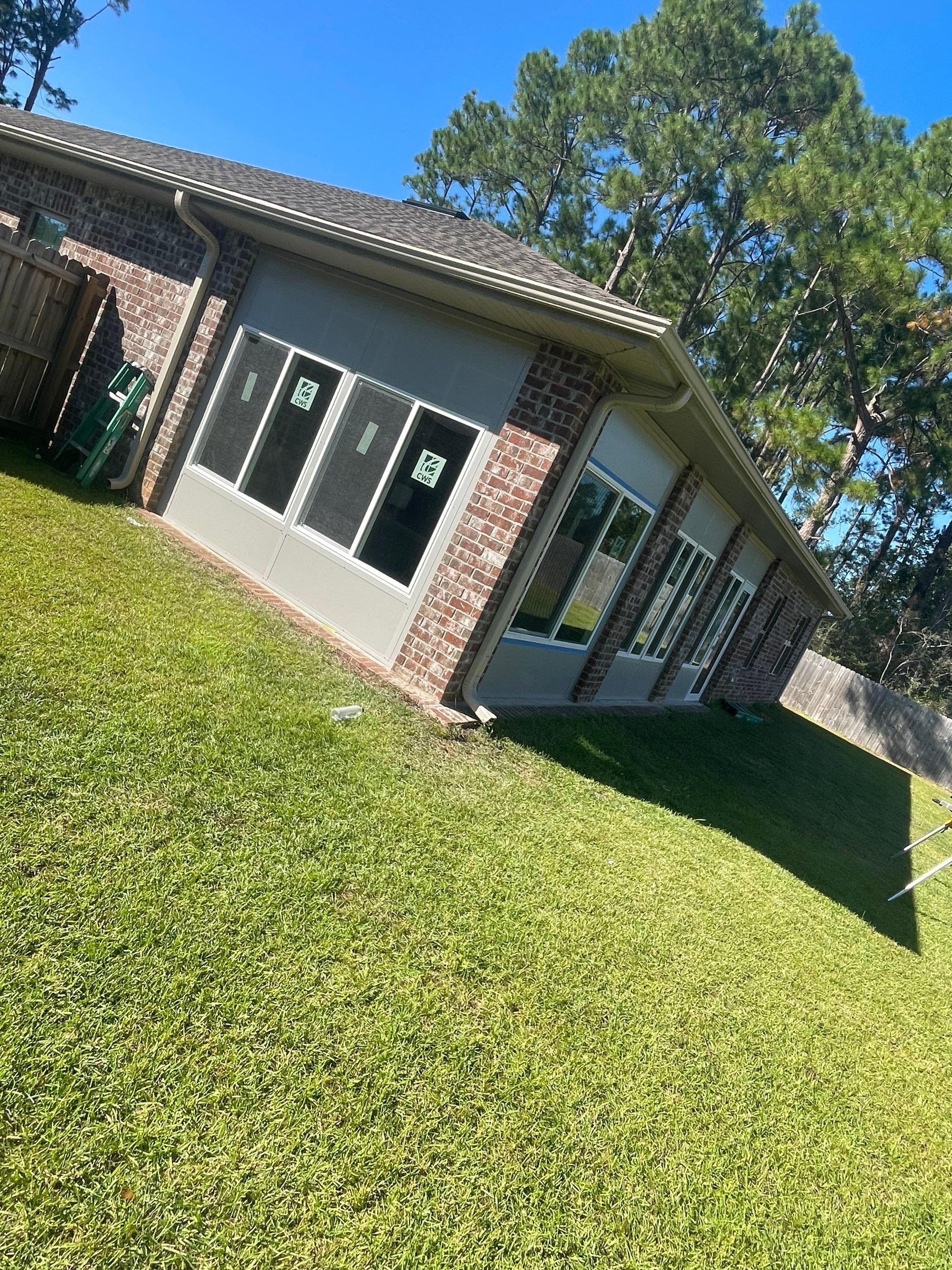 Glass Room Under Existing Patio Cover by Titan Sunrooms