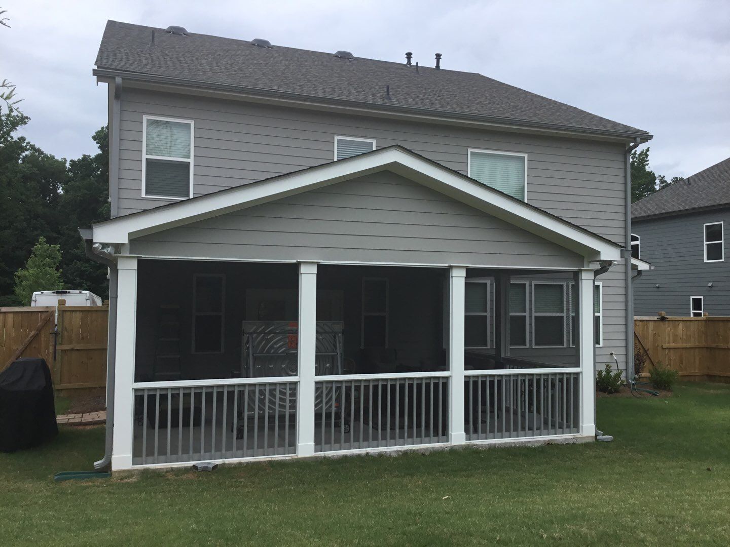 Screened Porch Addition With Gabled Roof and Tongue and Groove Ceiling by Swift Home Renovations