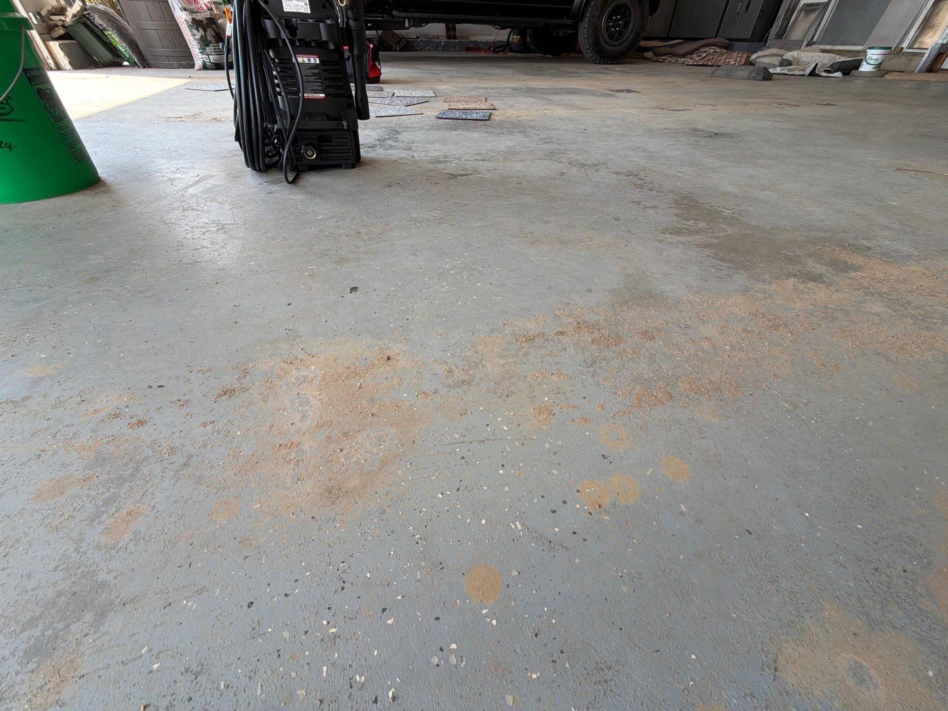 Feather Grey Garage Floor Coating Installation in Valley Springs by Select Painting, Coatings & Garage Cabinets