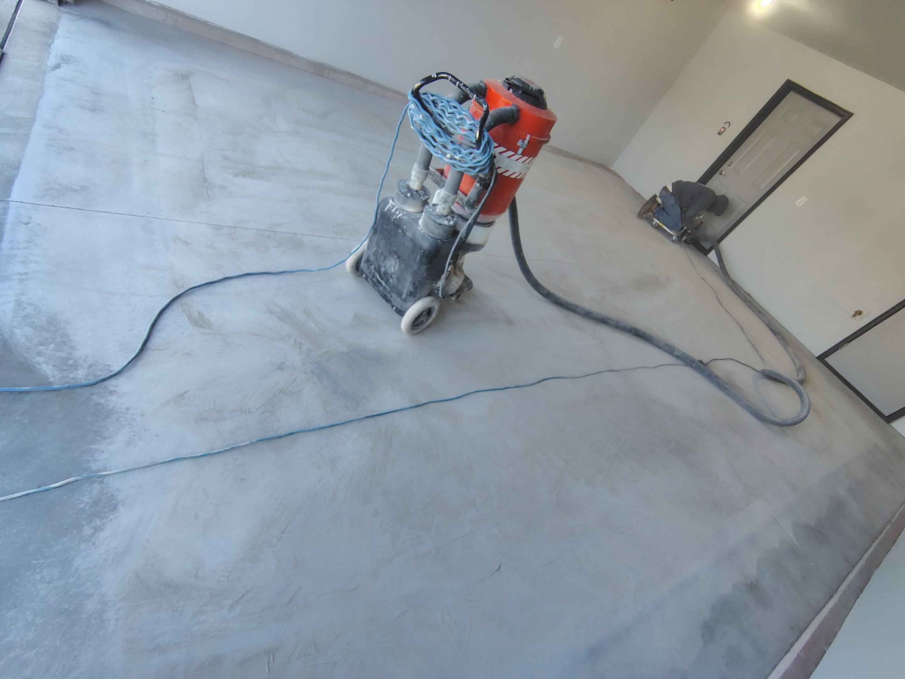 Custom Epoxy Garage Floor Coating Installation in Sioux Falls by Select Painting, Coatings & Garage Cabinets