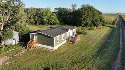 Riverdale Exterior Transformation | TAMKO Roofing & James Hardie Siding
