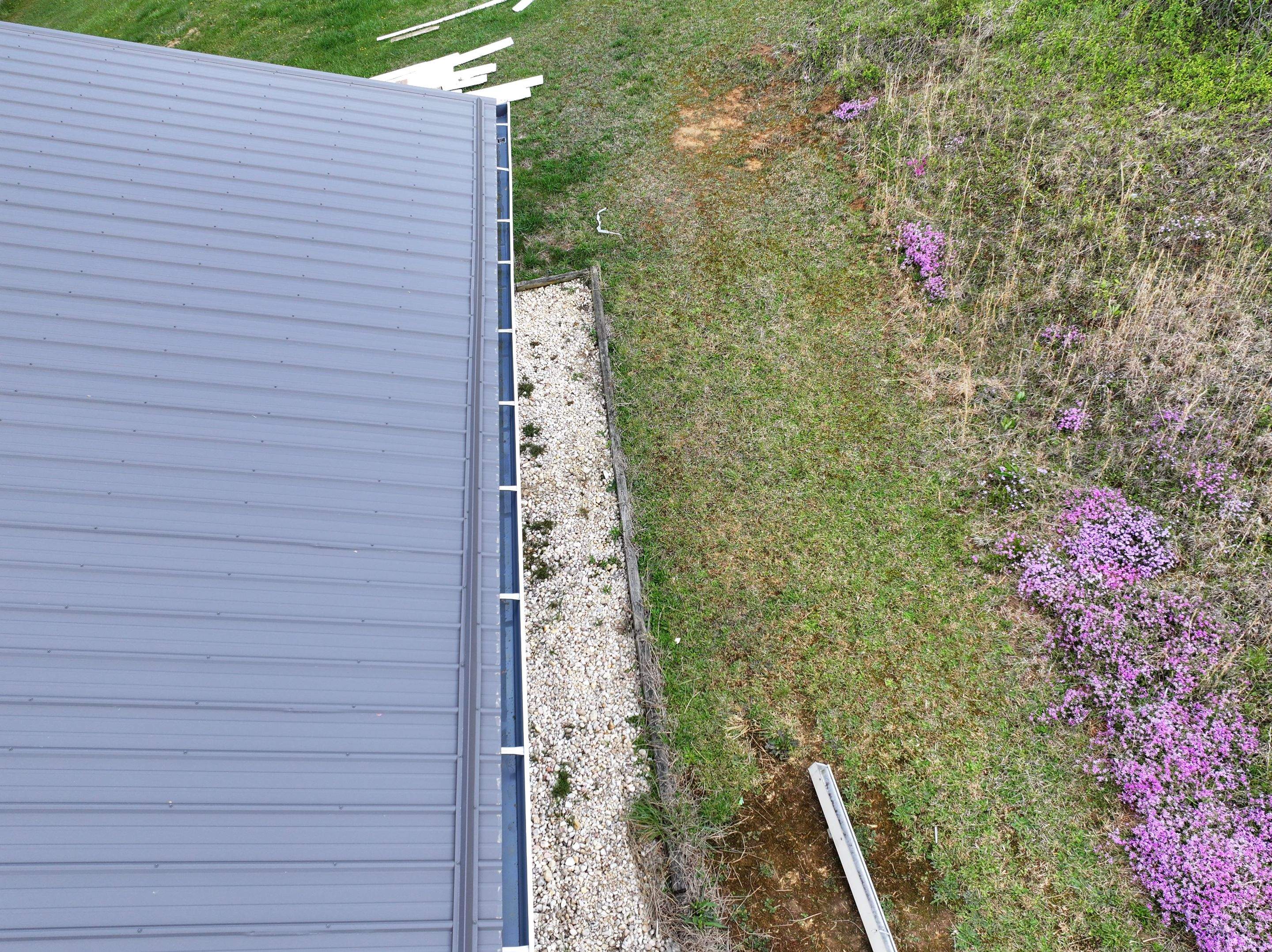 Charcoal Gray Textured Metal Roof by Omnia Roofing