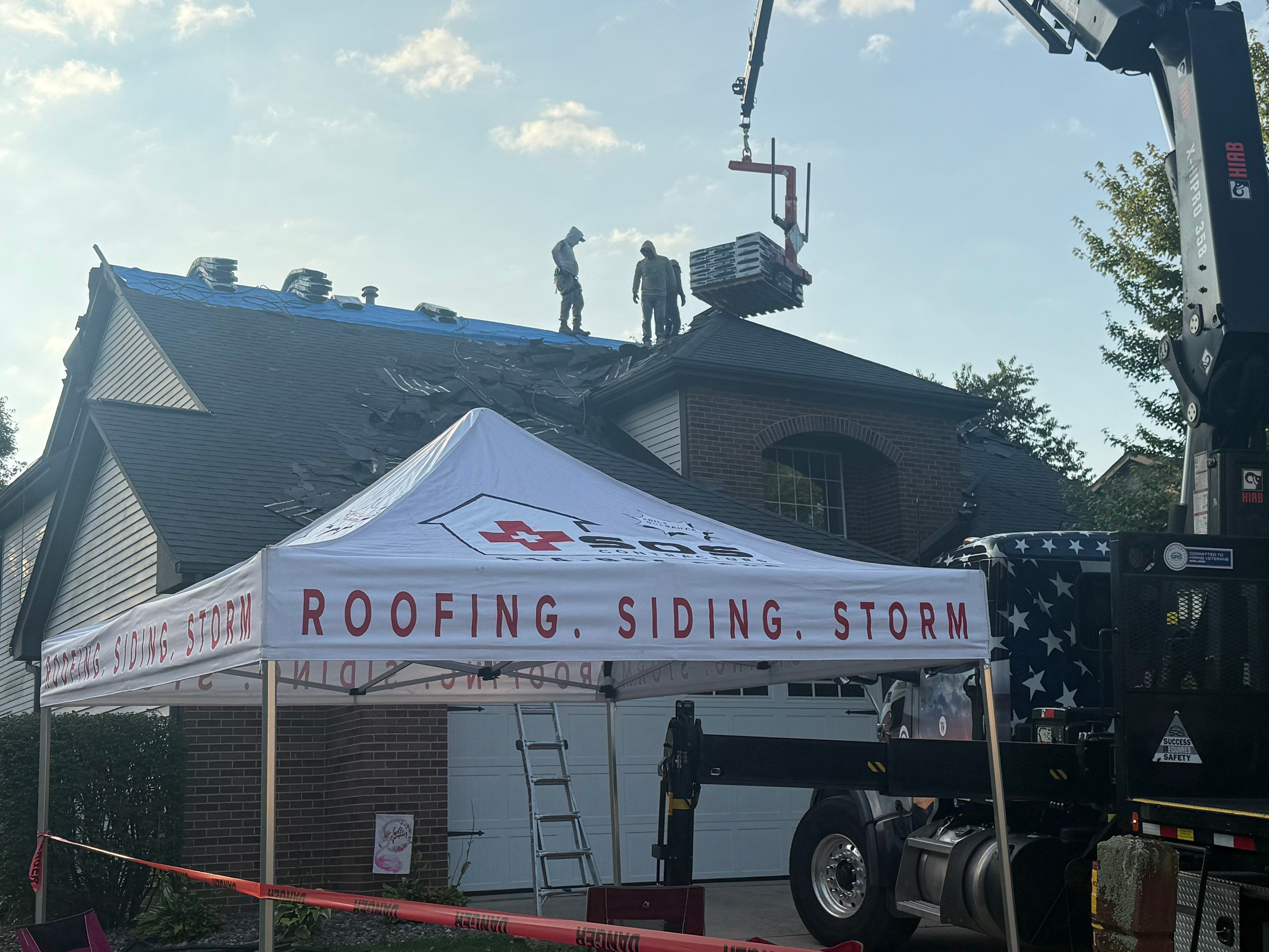 Full replacement - insurance paid. Big brick flashing work by SOS Home Ohio 
