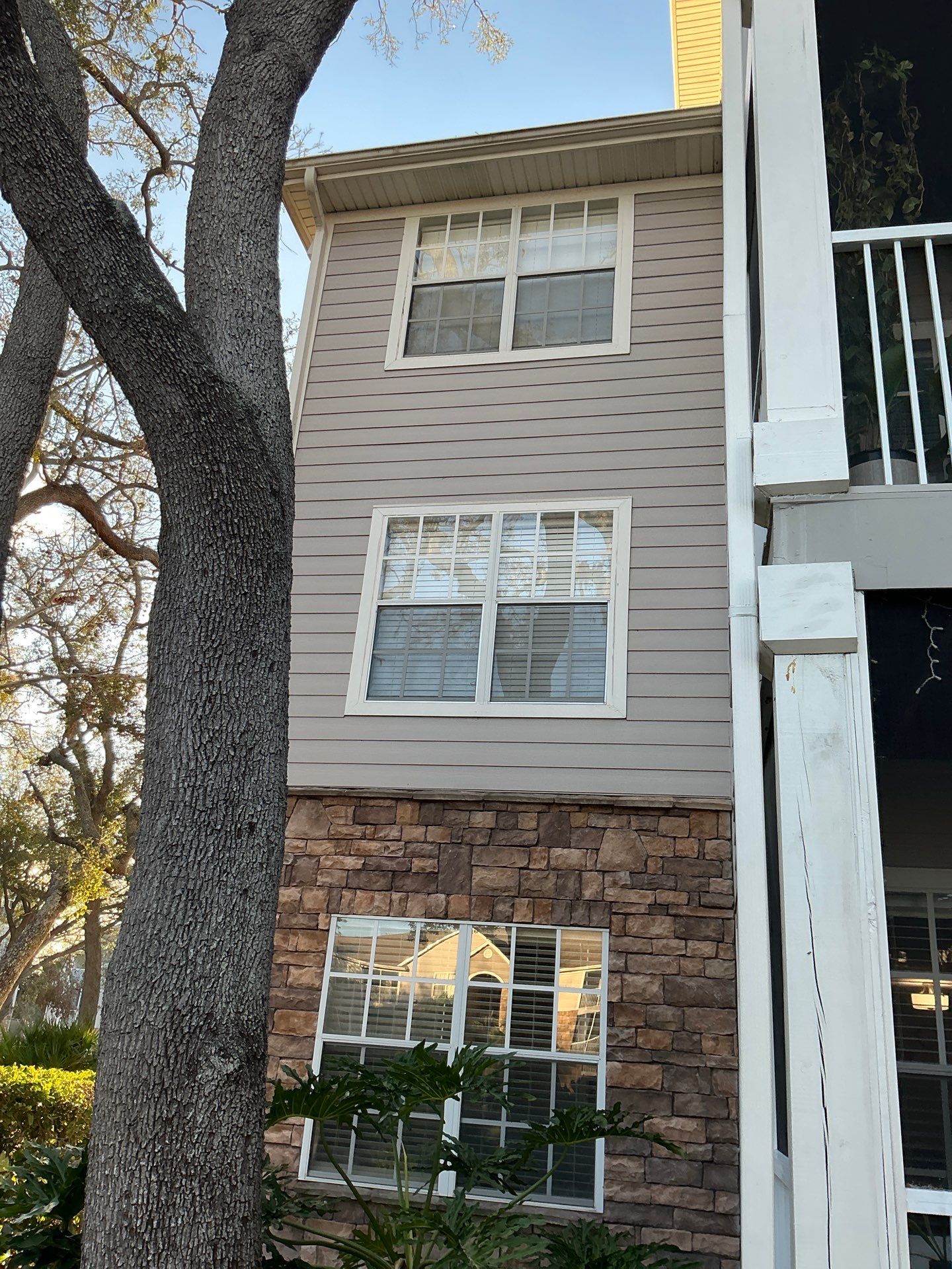 Downspouts for the High Buildings in Tampa FL by Gutter Professors
