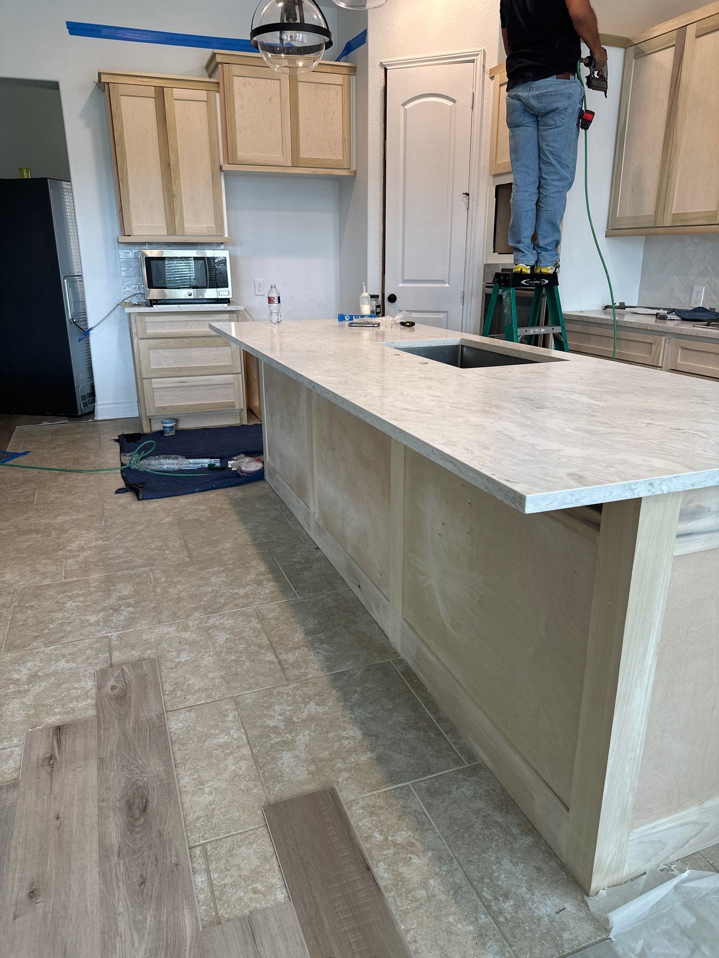 Kitchen Remodel using Water mitigation equipment by L&T General Contractors and Restoration INC