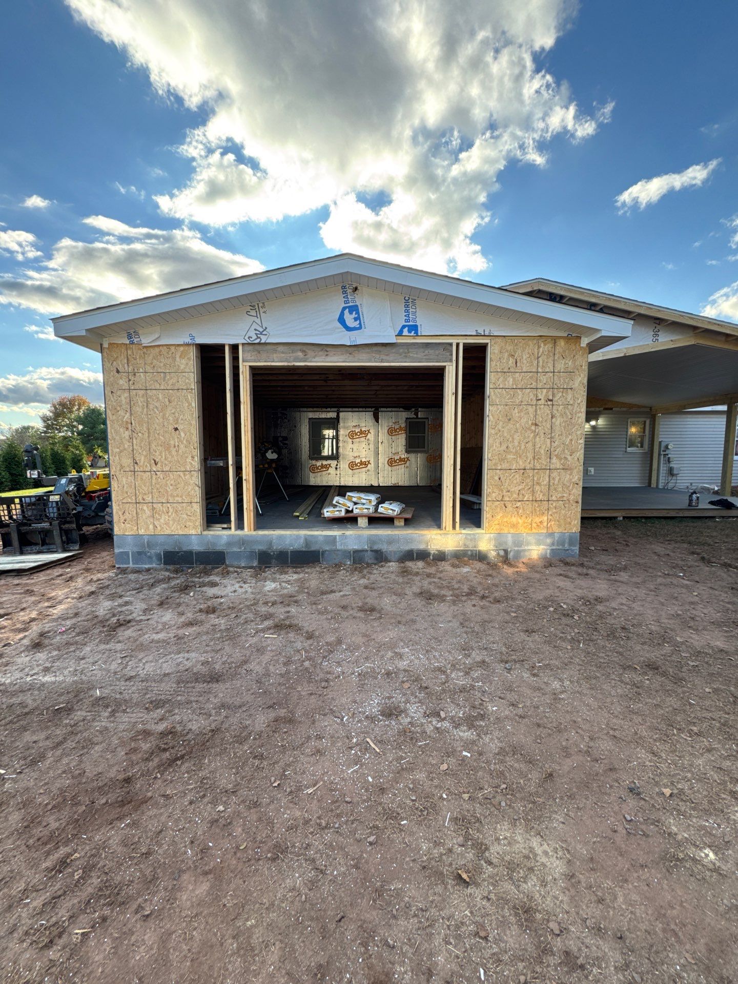 Residential Addition and Covered Porch Roof  by Esh Builders