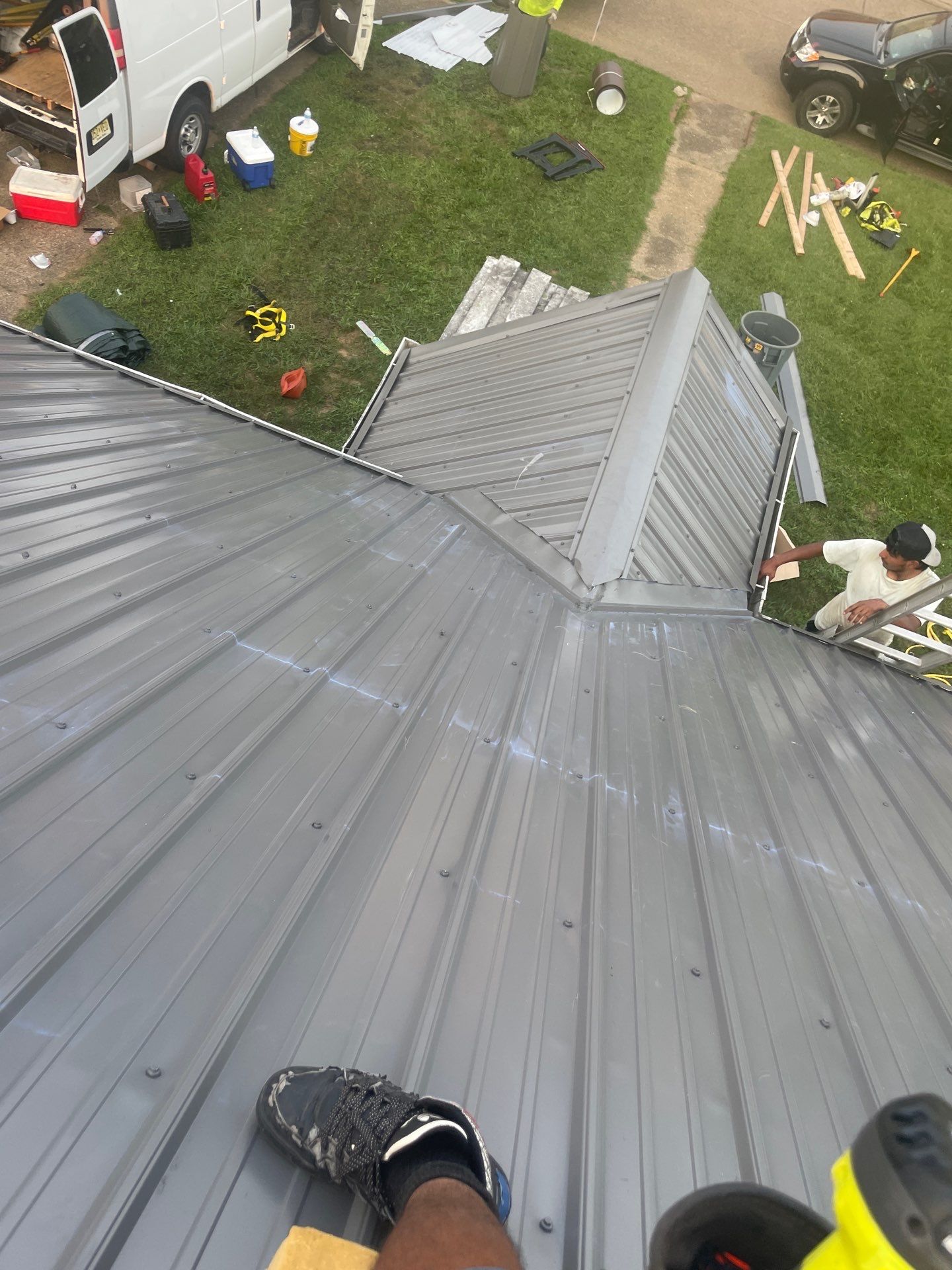 Residential Roofing Installation using Metal by Rainstoppers Roofing