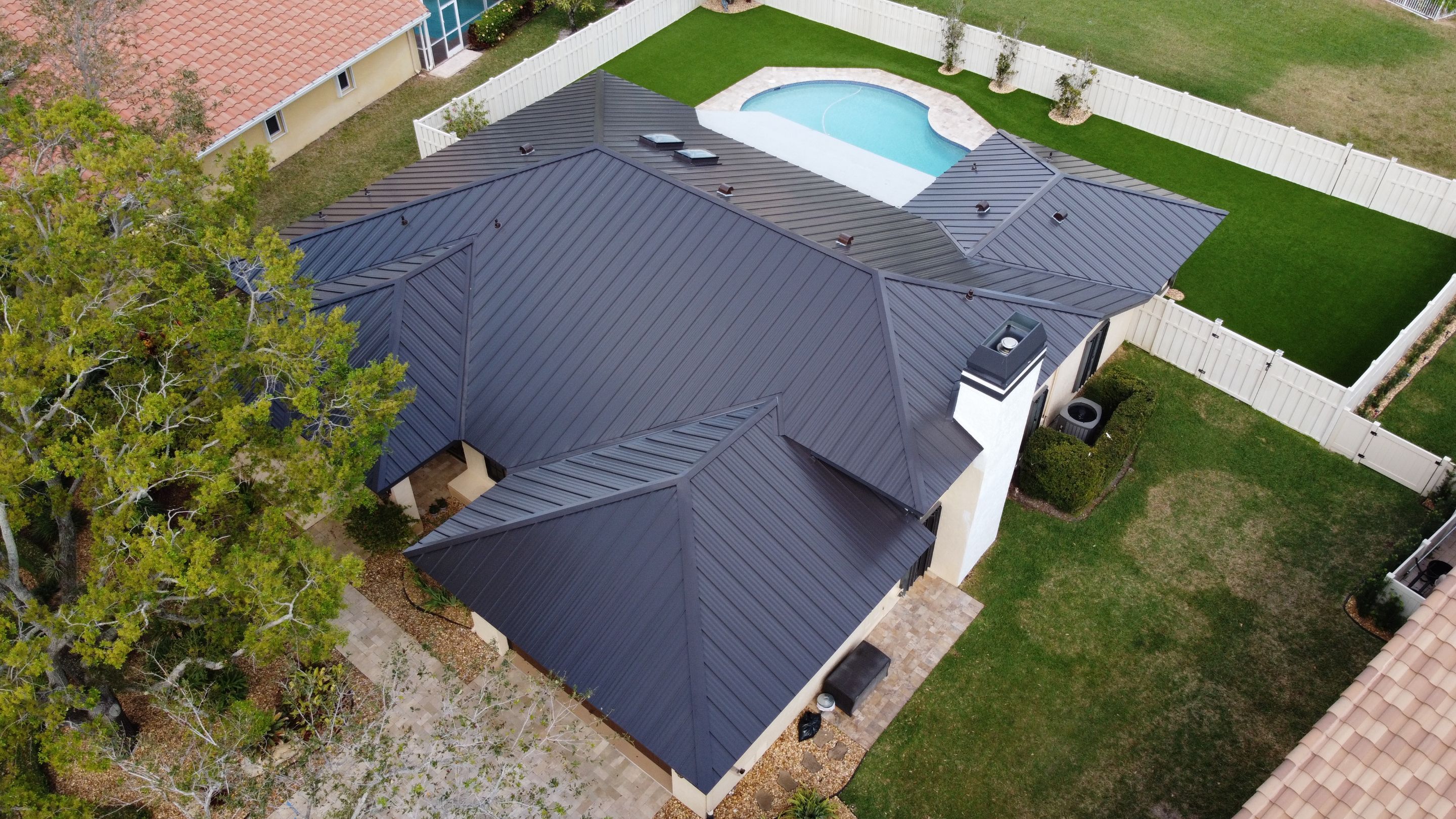 Residential Roofing Installation using 1" Nail strip metal roof by BLUES BROTHERS ROOFING