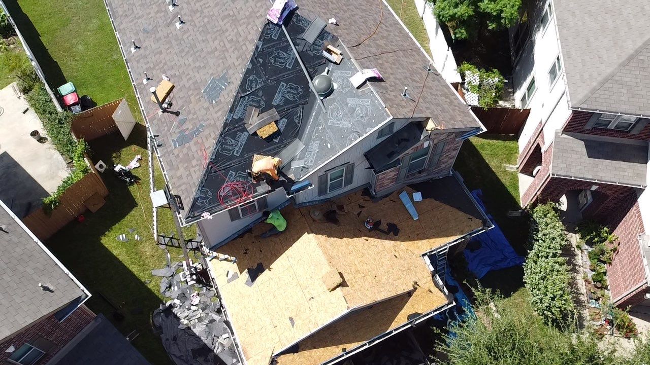 Owens Corning Shingle Roofing Replacement for Houston Two-Story Home by Houston Roofing & Construction