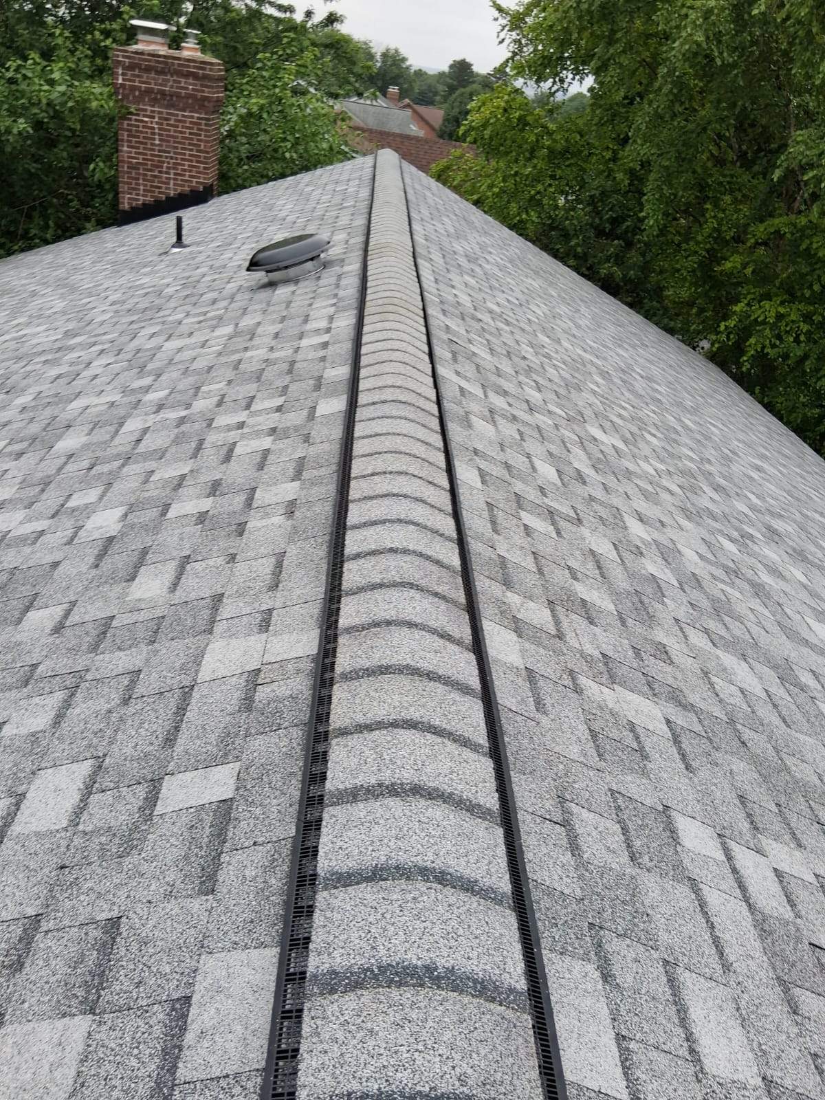 Roof Replacement with Skylight Installation in Frederick, MD by ARCH Exteriors 