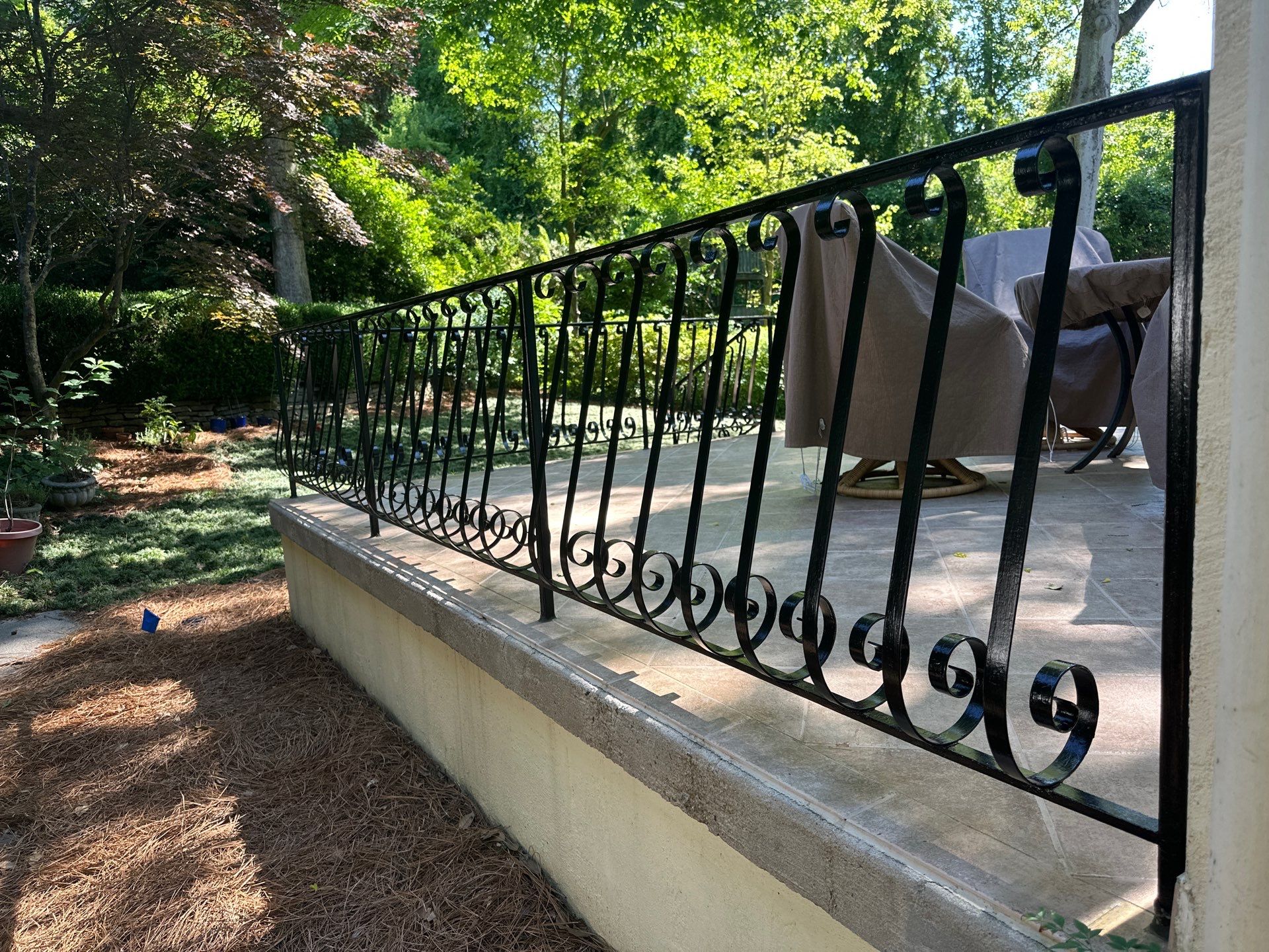 Rear Exterior Upgrade: Railings, Fence, and Stucco Column Restoration by Atlanta's Paint Doctor
