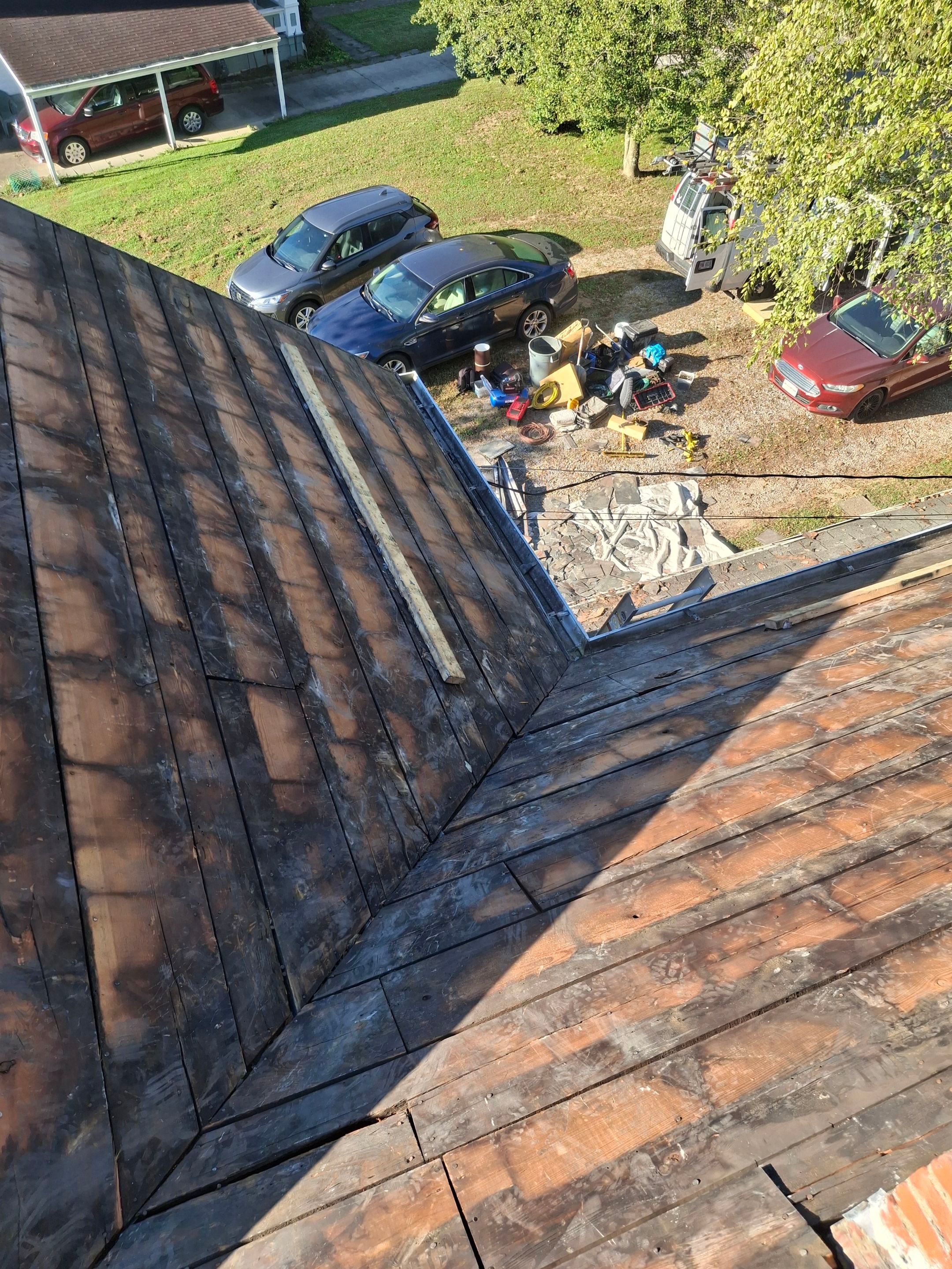 Residential Roofing Installation using Metal by Rainstoppers Roofing